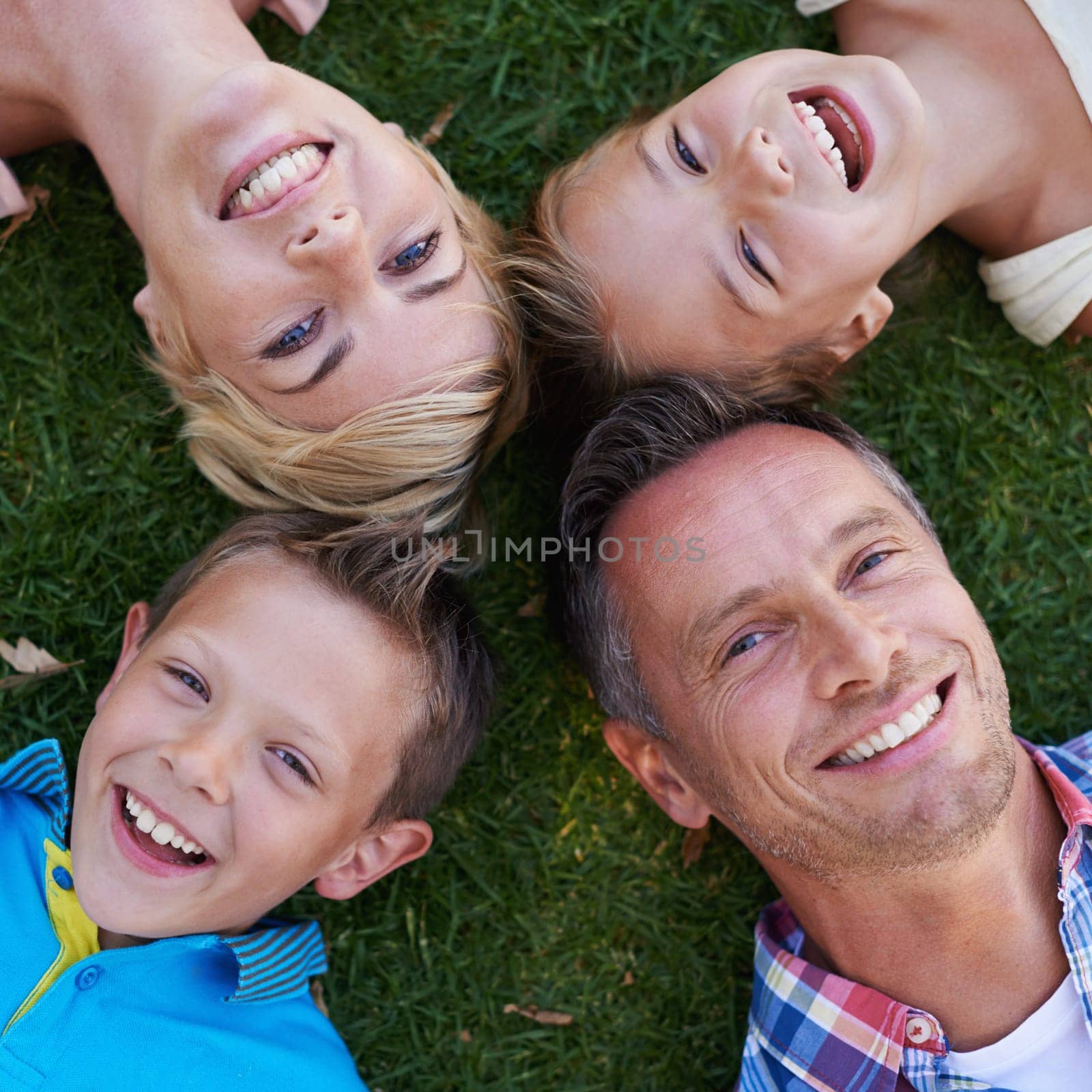 Parents, children and portrait on grass from above or family holiday or travel destination, environment or happiness. Men, woman and siblings in backyard for summer bonding in Australia, kids or love.