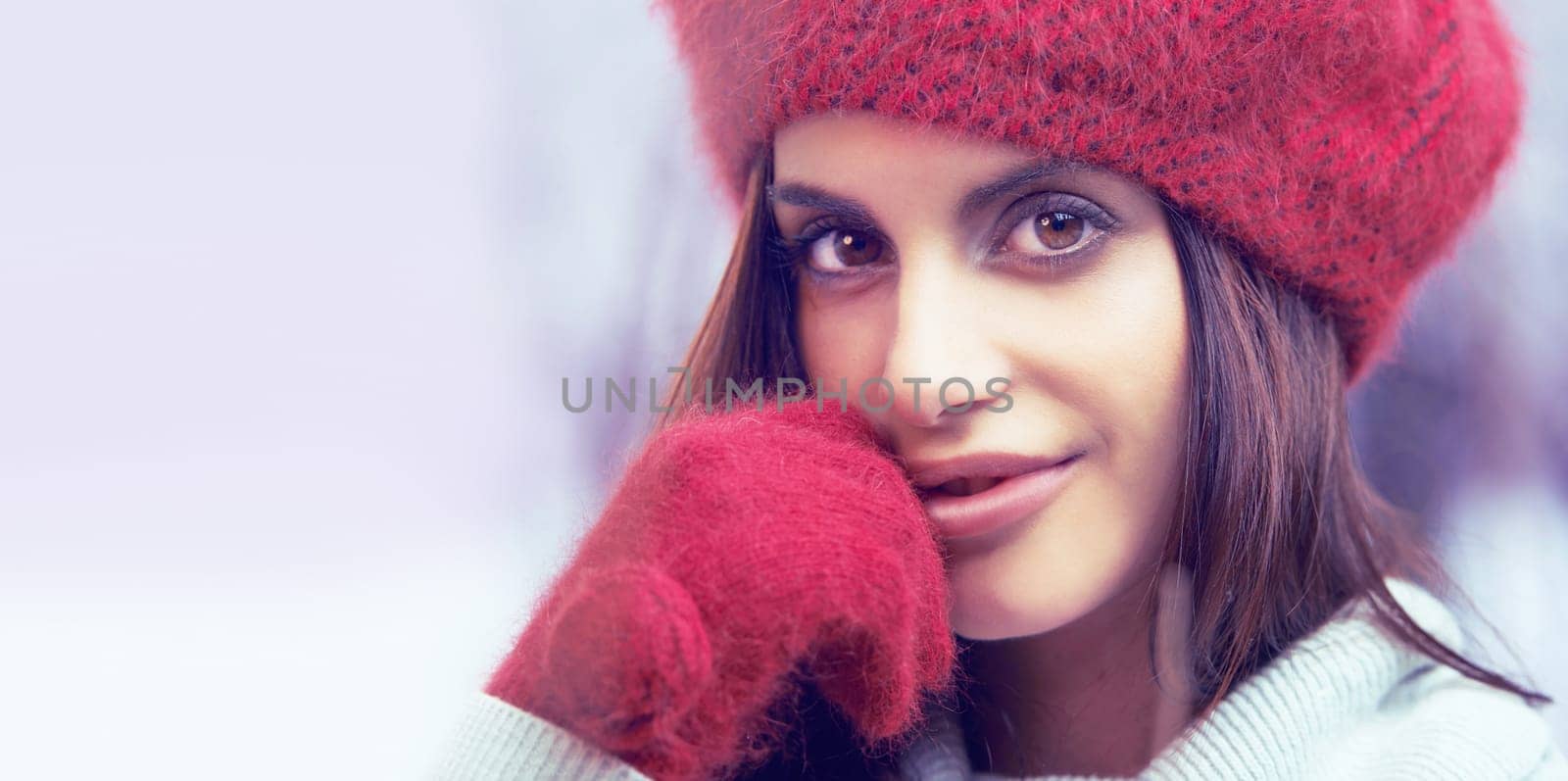 Style, beauty and portrait of woman with winter clothes on cold weather vacation or holiday. Serious, makeup and face of female person with gloves and beanie for trendy fashion for weekend trip. by YuriArcurs