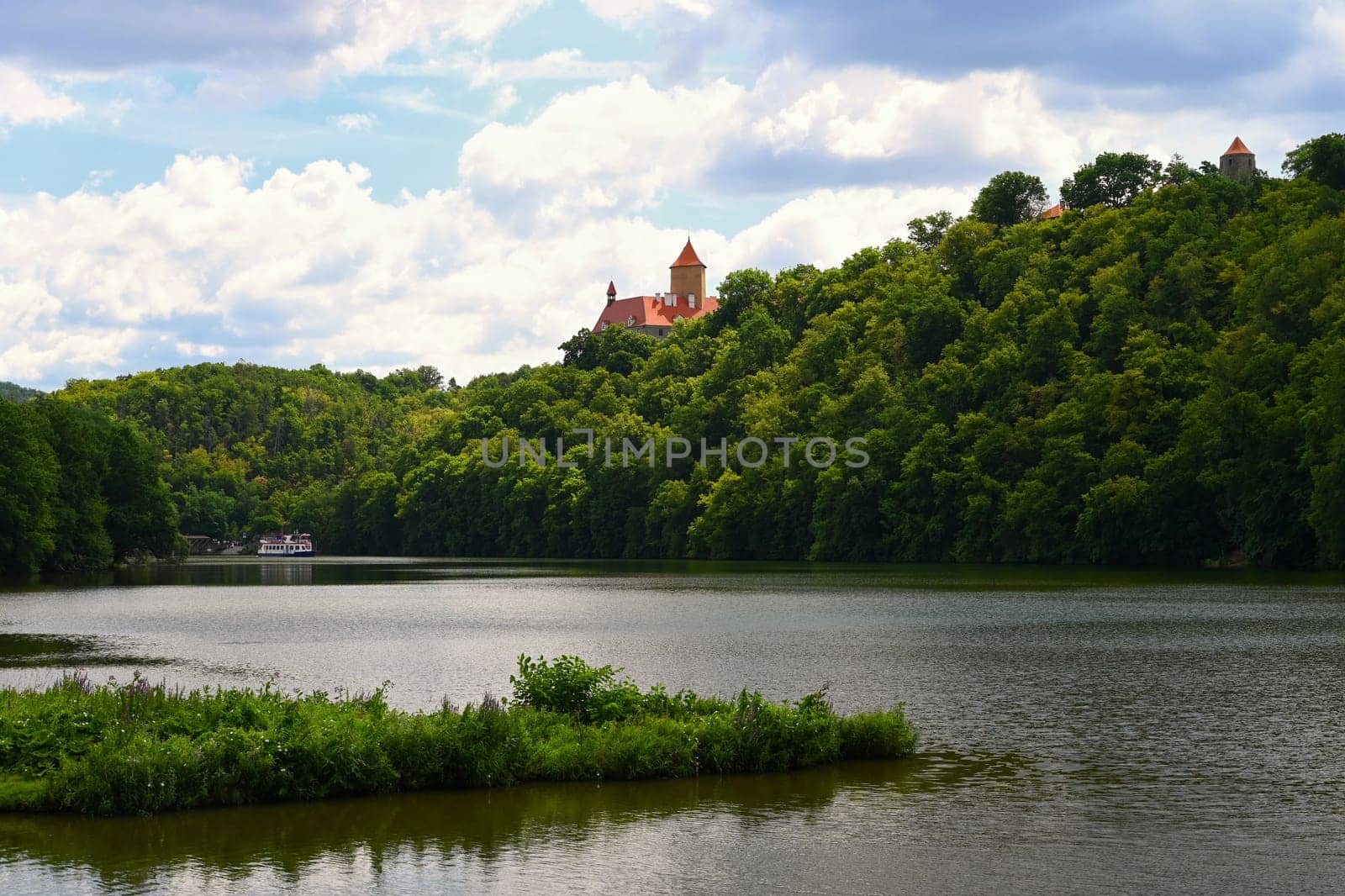 Beautiful Gothic castle Veveri. The city of Brno at the Brno dam. South Moravia - Czech Republic - Central Europe. Spring landscape. by Montypeter