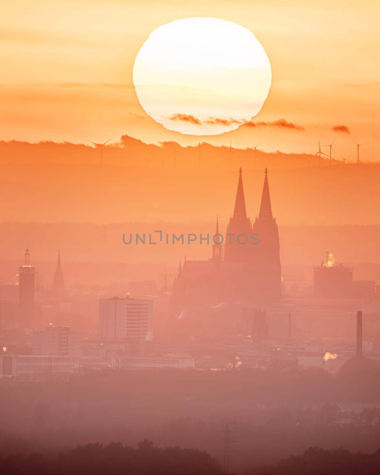 Cologne against sunset, North Rhine Westphalia, Germany by alfotokunst