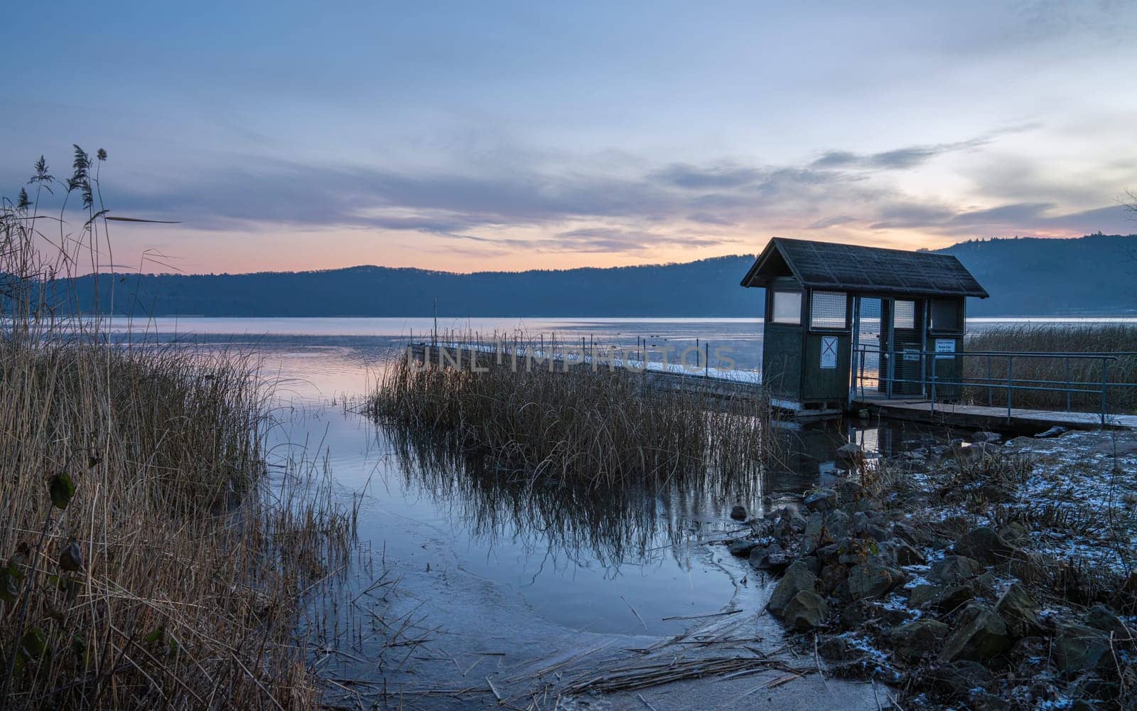 Panoramic image of Laacher lake during morning hours, Eifel, Rhineland-Palatinate, Germany