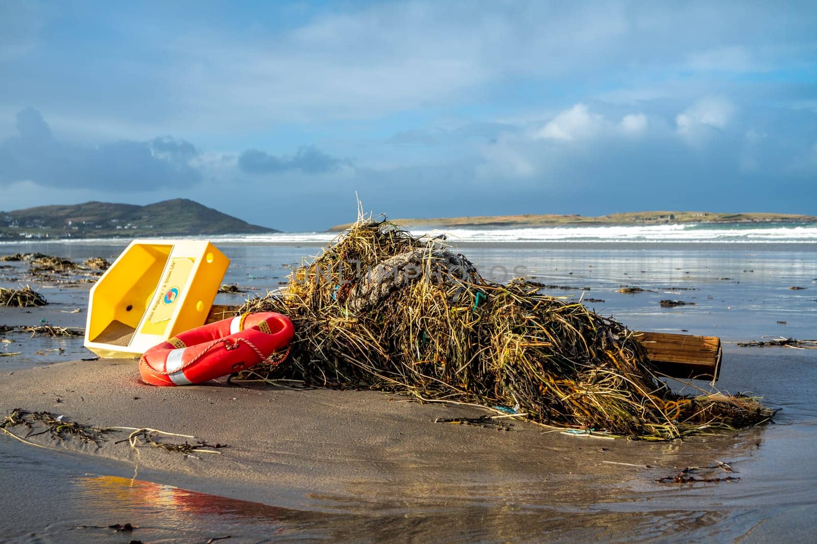 NARIN, PORTNOO / IRELAND - JANUARY 15 2020 : Ringbuoy lying on Portnoo beach in County Donegal after storm Brendan.