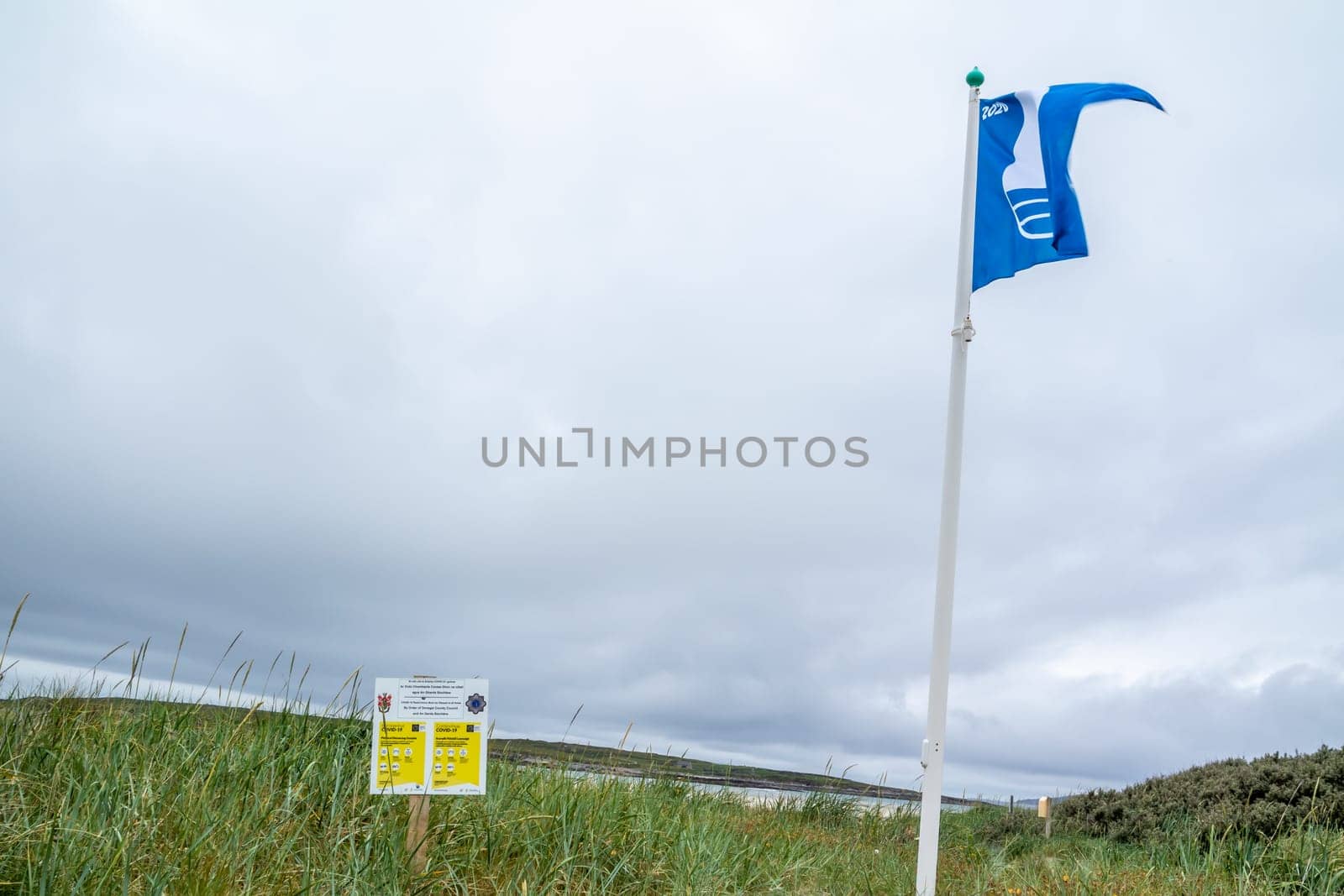 PORTNOO, COUNTY DONEGAL / IRELAND - JUNE 17 2020: Sign explaining the 2m social distancing rule at the beach.