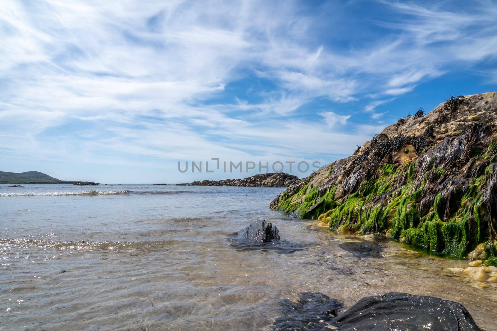 The rocks of Carrickfad by Portnoo at Narin Strand in County Donegal Ireland.