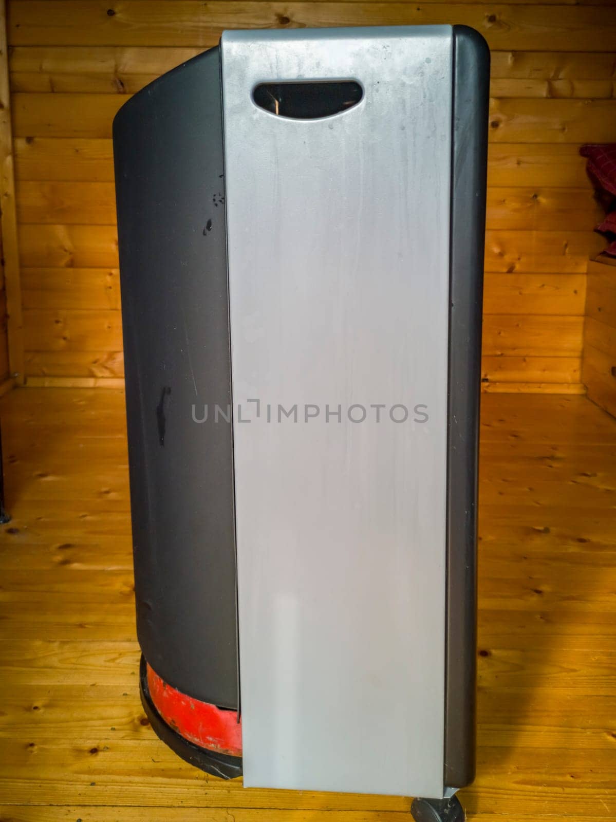 Mobile gas heater with bottle for camping.