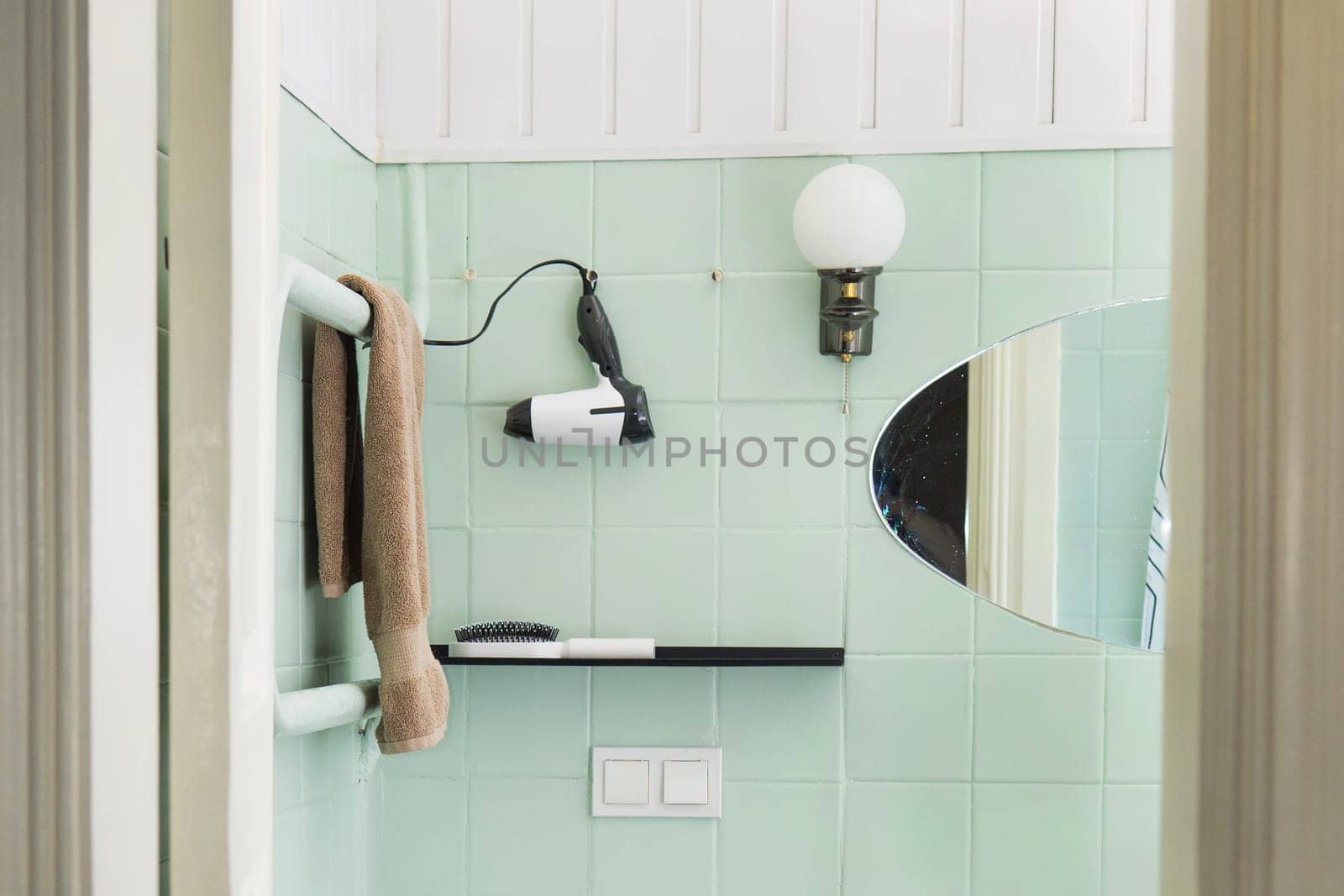 Budget bathroom interior in bright colors. Details of the bathroom interior