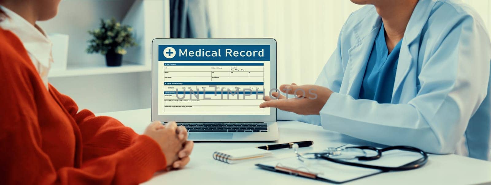 Laptop display medical report or diagnostic result of patient health on blurred background of doctor's appointment in hospital. Medical consultation and healthcare treatment. Panorama Rigid