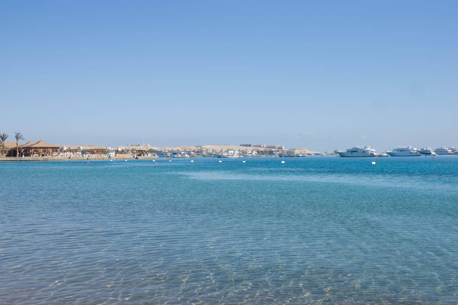 Beach Relaxation at the Red Sea. Fairy-tale Moments of a Sunny Day. The concept of tourism and sea travel.