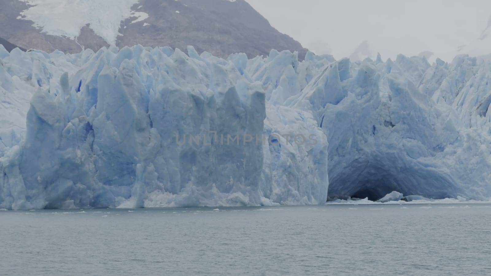 Boat tour video displays the grandeur of Perito Moreno Glacier's walls and ice tunnels in slow-mo.