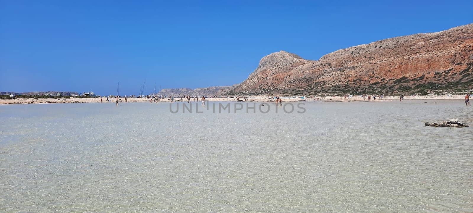 Crete, Greece - August-0 02- 2013: Balos lagoon, between the island and the coast of Crete. by Costin