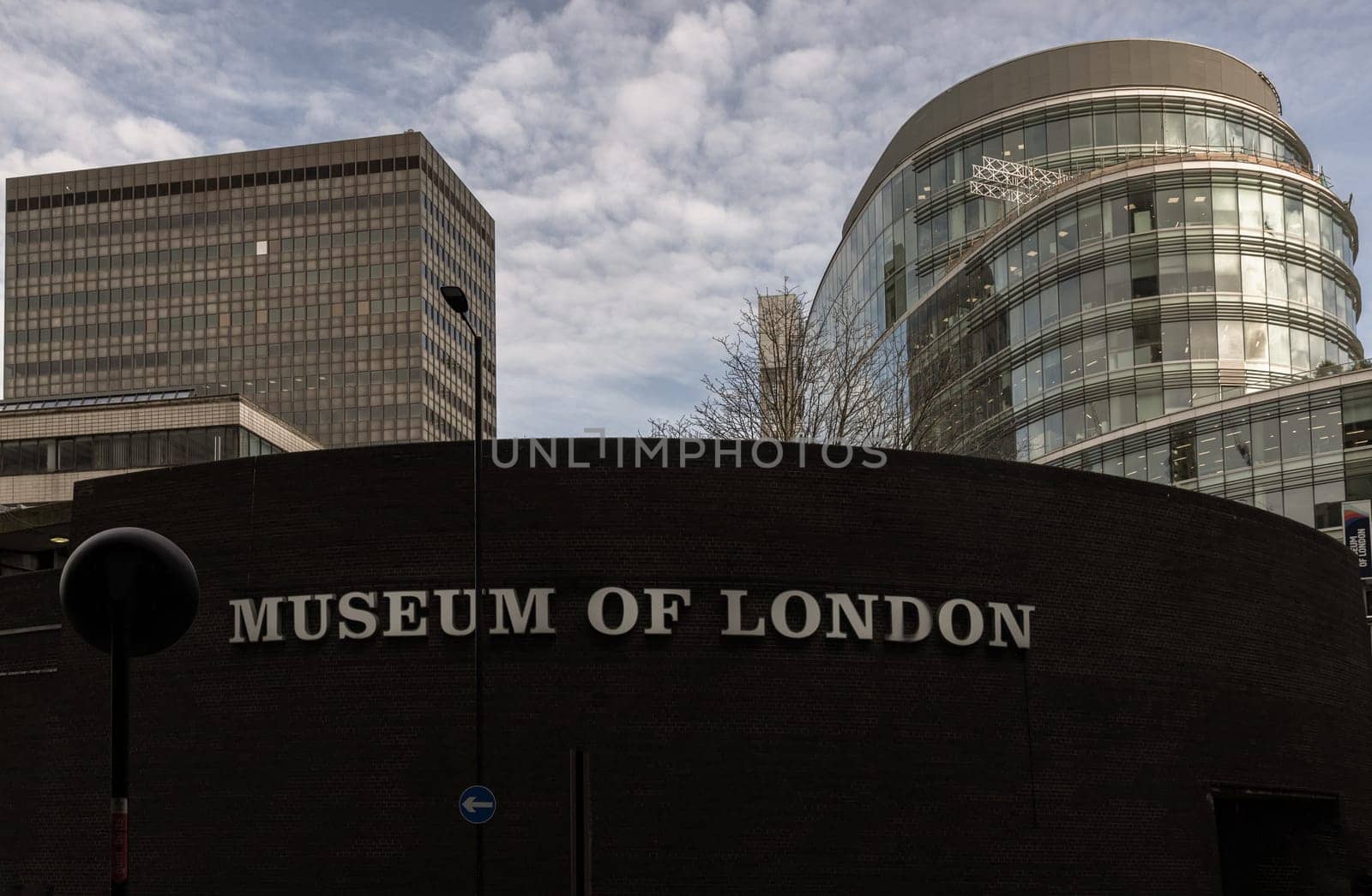 London, UK - Feb 27, 2024 - The exterior wall of The Museum of London documents the history from prehistoric to modern times. The museum is located on London Wall, Space for text, Selective focus.