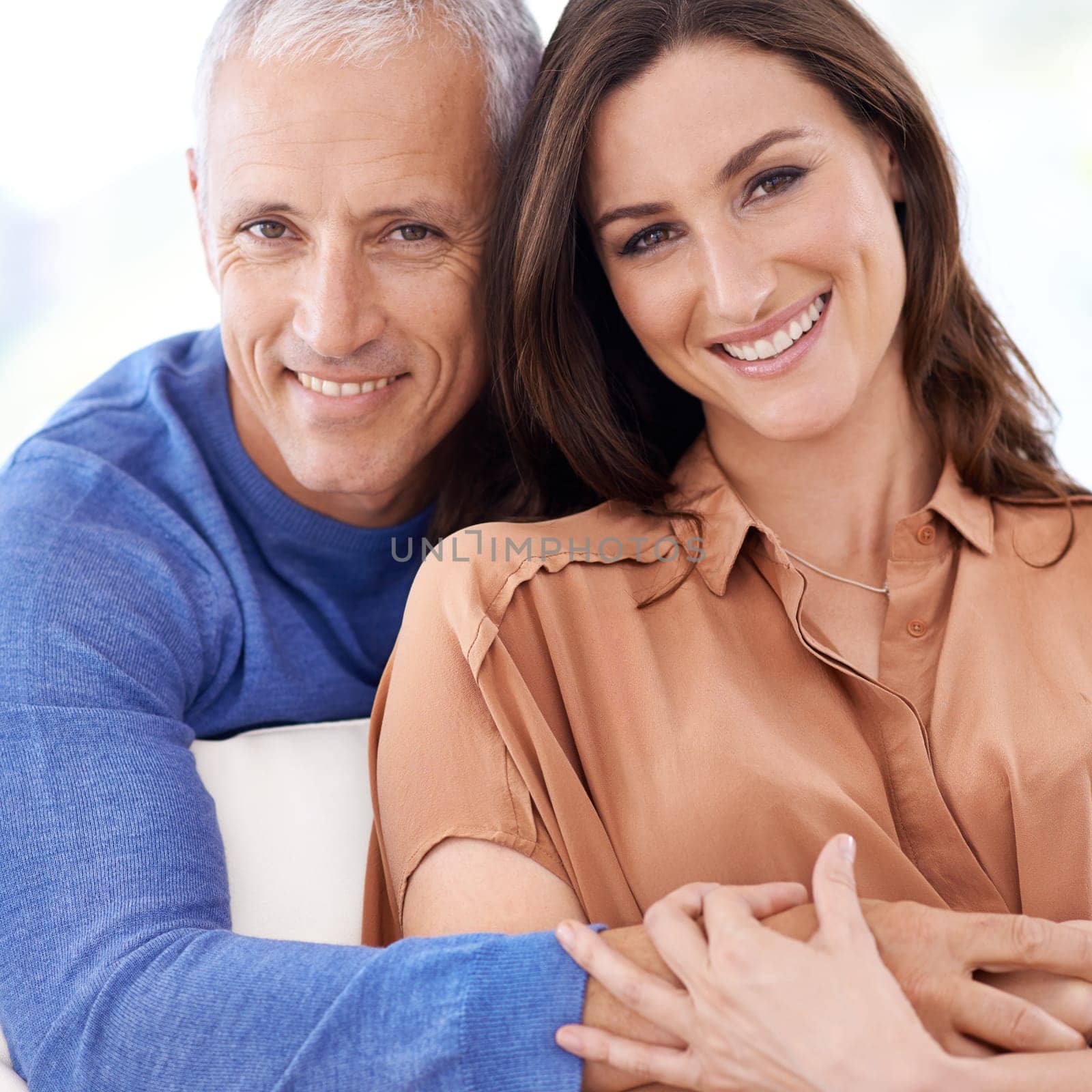 Couple, age difference and hug in portrait, love with unique relationship and support for trust at home. Senior man, young woman in marriage, commitment and loyalty with partner and pride together.