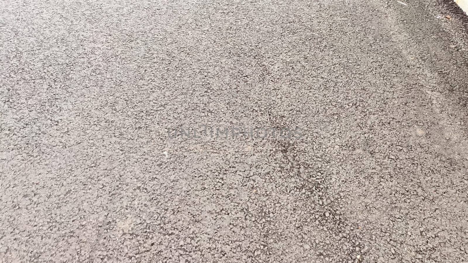 Asphalt as texture, background, place for text. Gravel texture for background