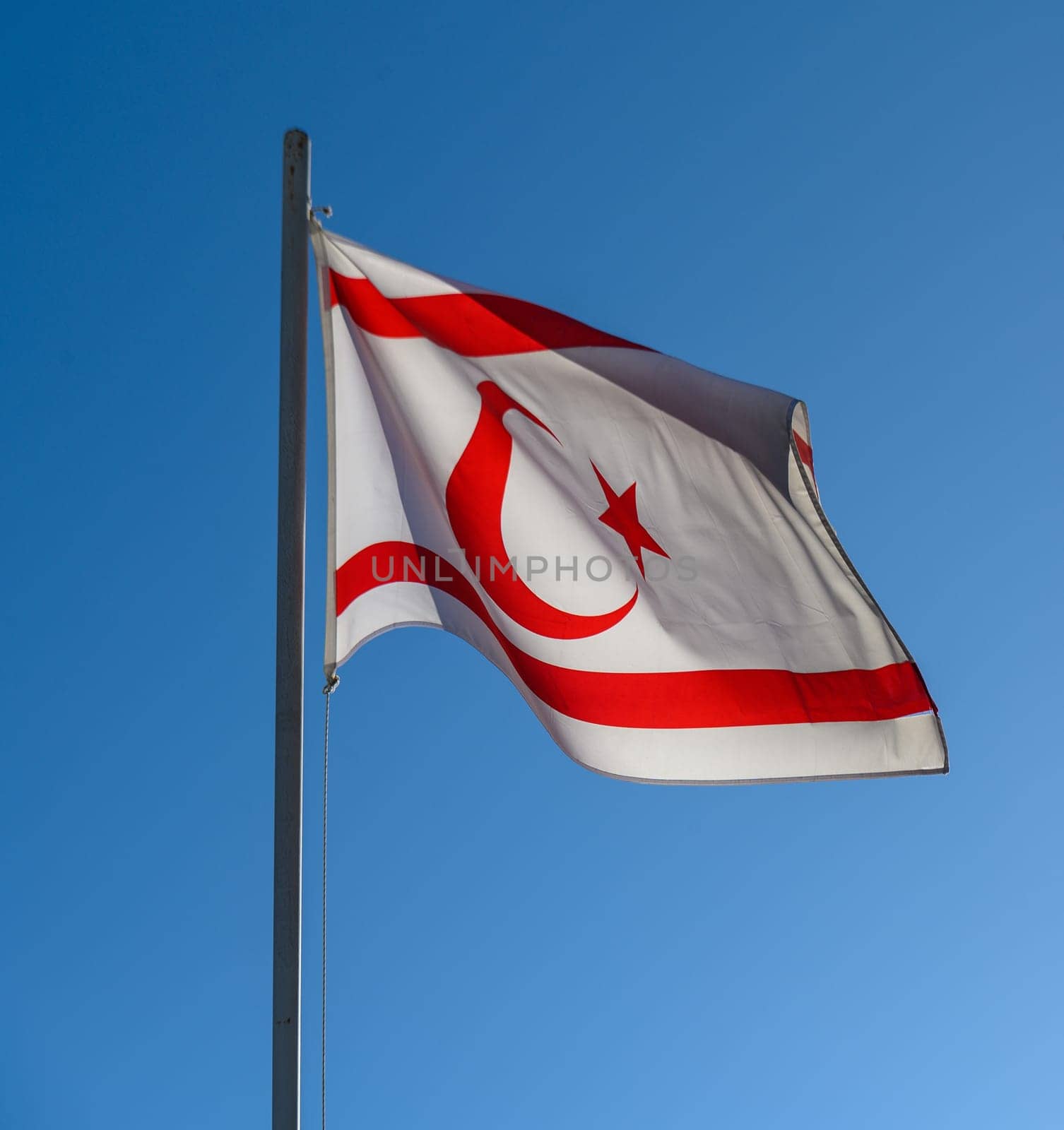 National flag of Turkish Republic of Northern Cyprus on a flagpole 1 by Mixa74