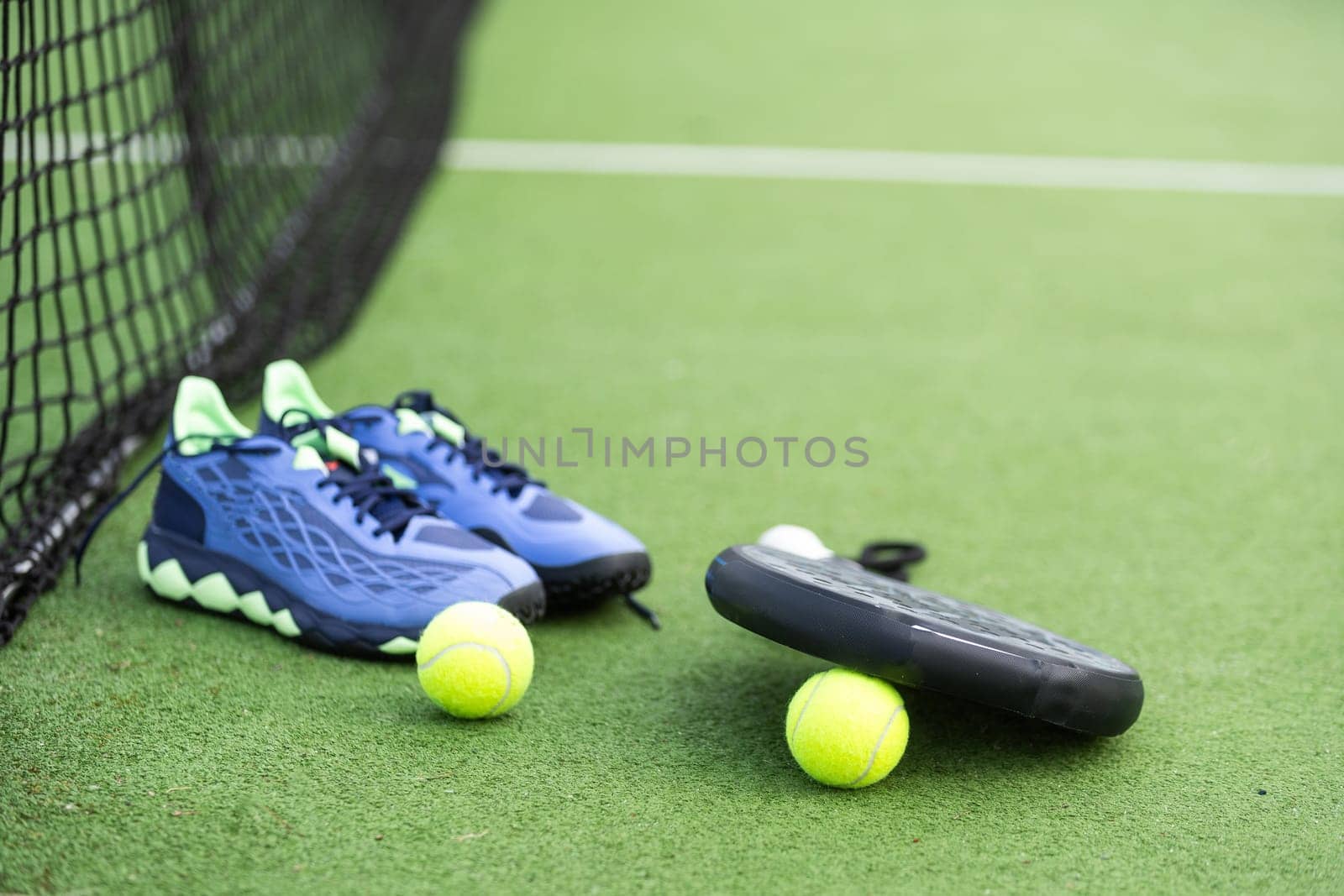 Paddle tennis objects and court. High quality photo