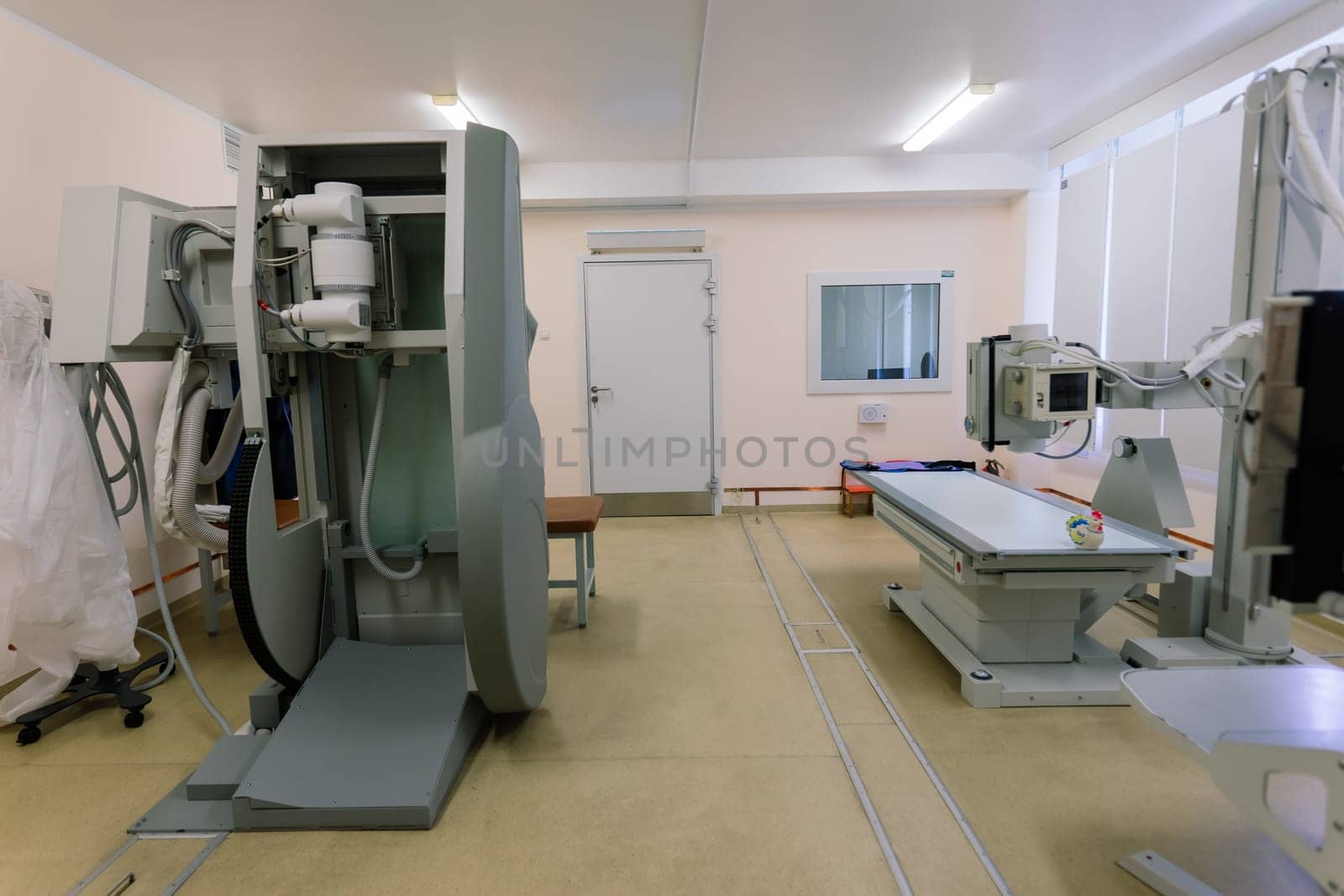 Interior of new operating room with equipment in modern clinic by Zelenin