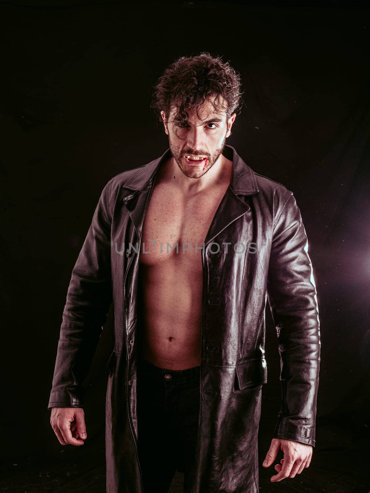 Man in leather jacket kneeling down by artofphoto