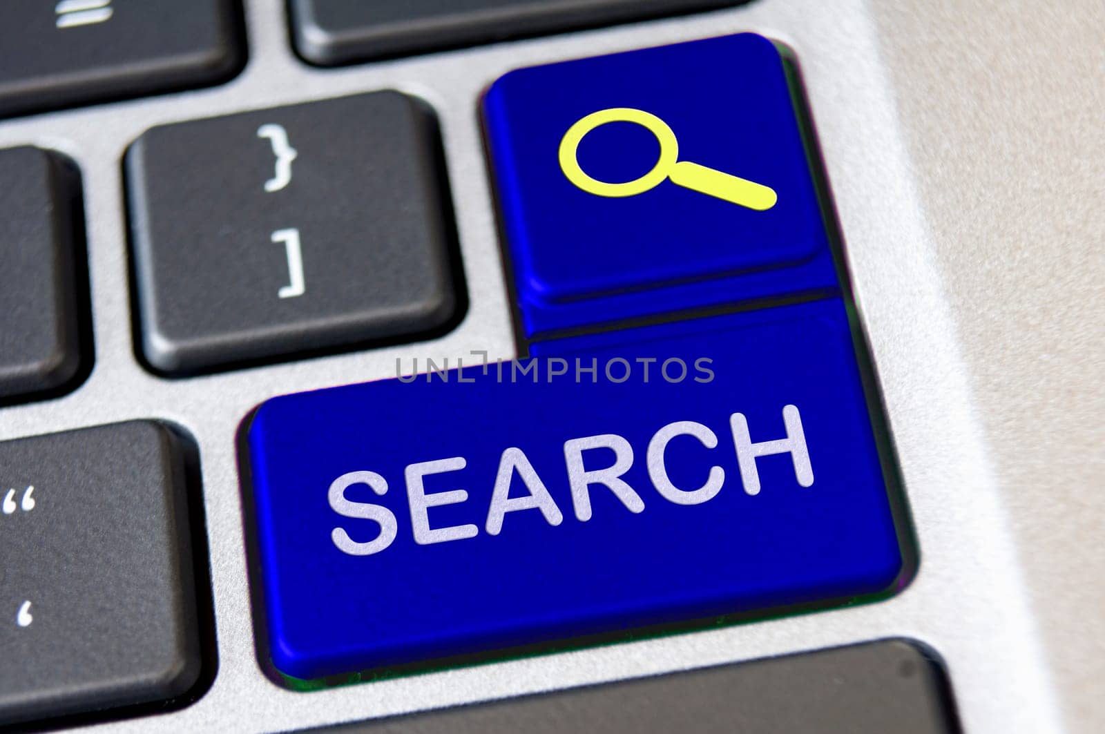 Search text on blue laptop keyboards. Web search concept.