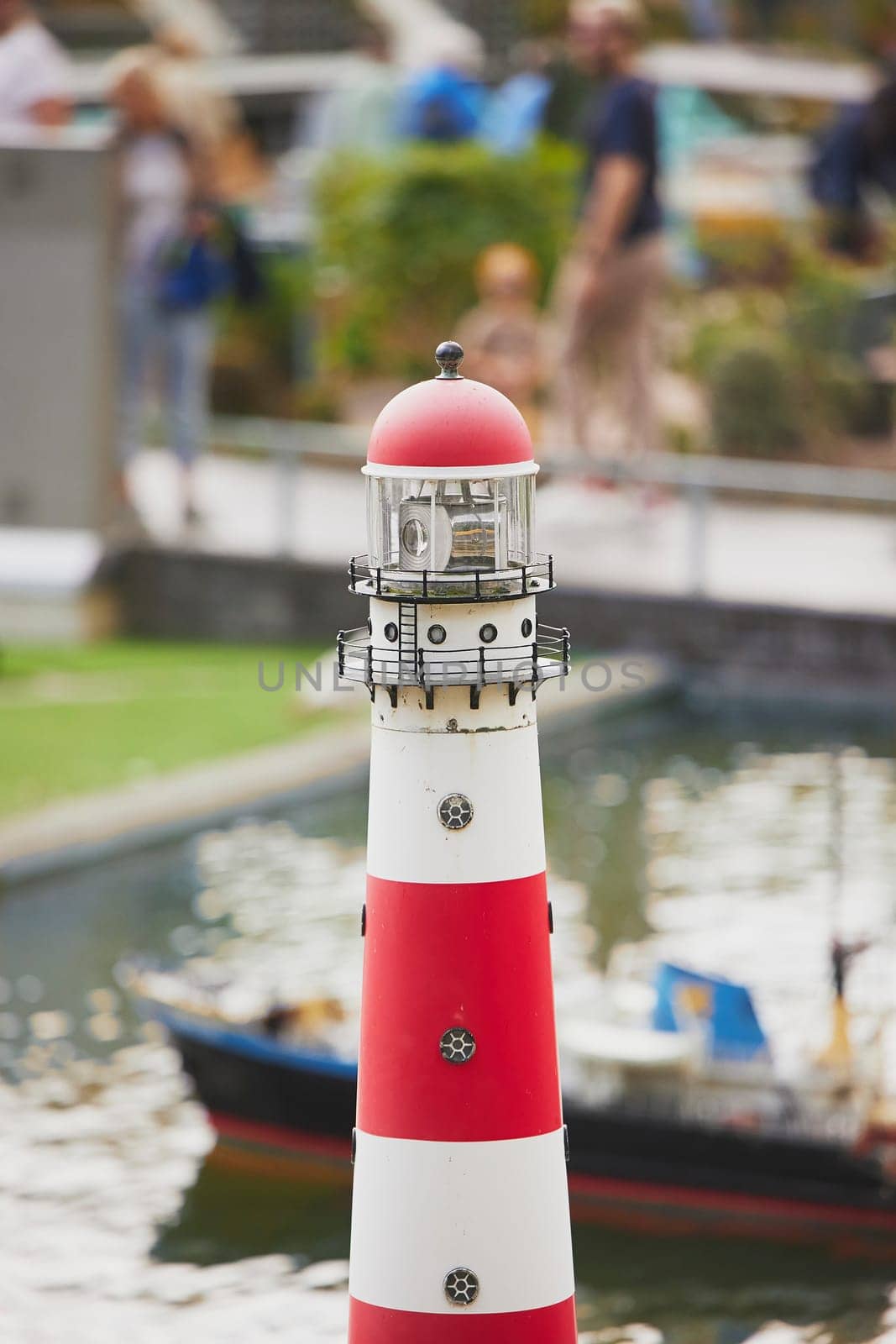 Toy lighthouse in a miniature city in the Netherlands by Viktor_Osypenko