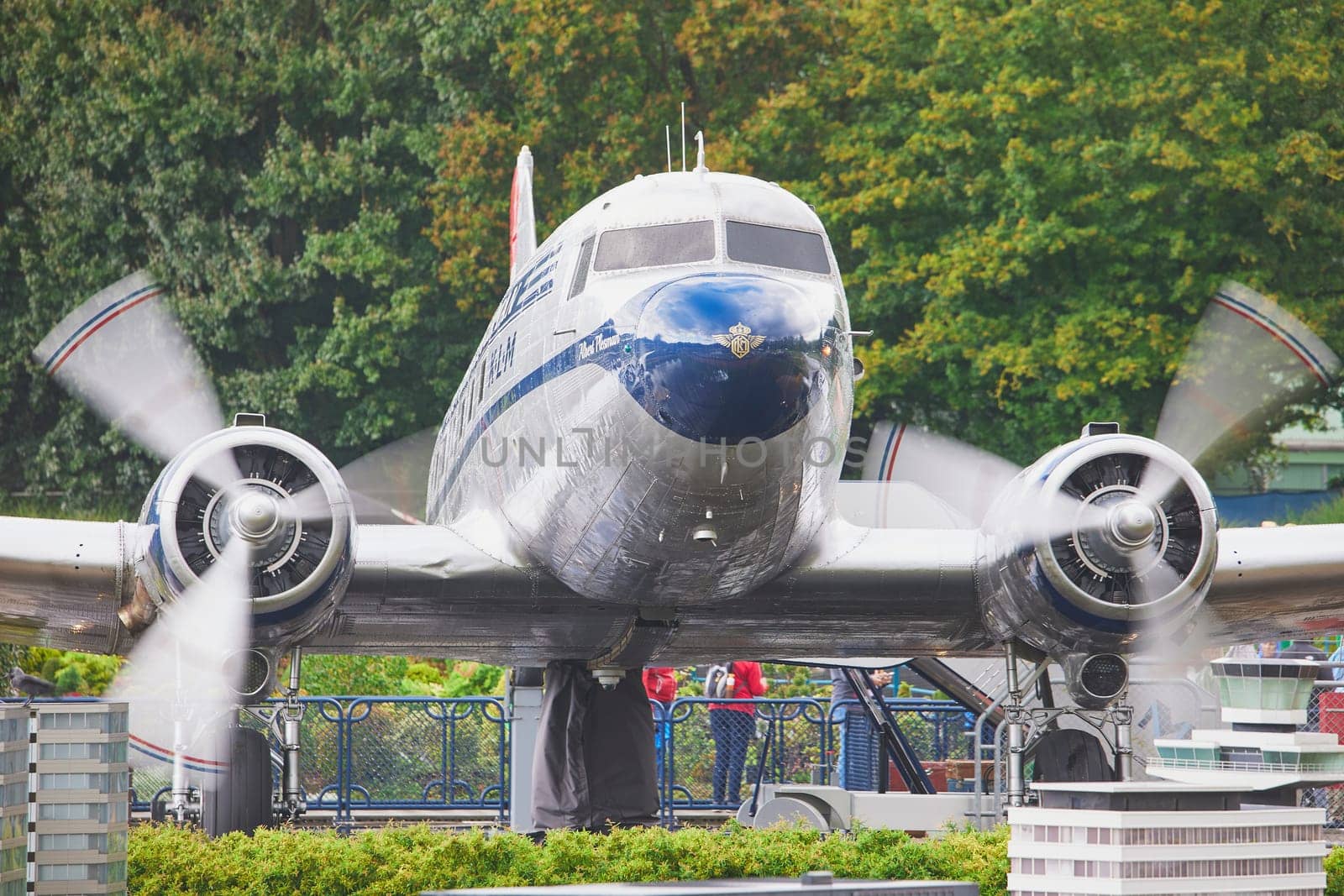 The Hague, Netherlands, August 30, 2023: Old plane in Madurodam park by Viktor_Osypenko