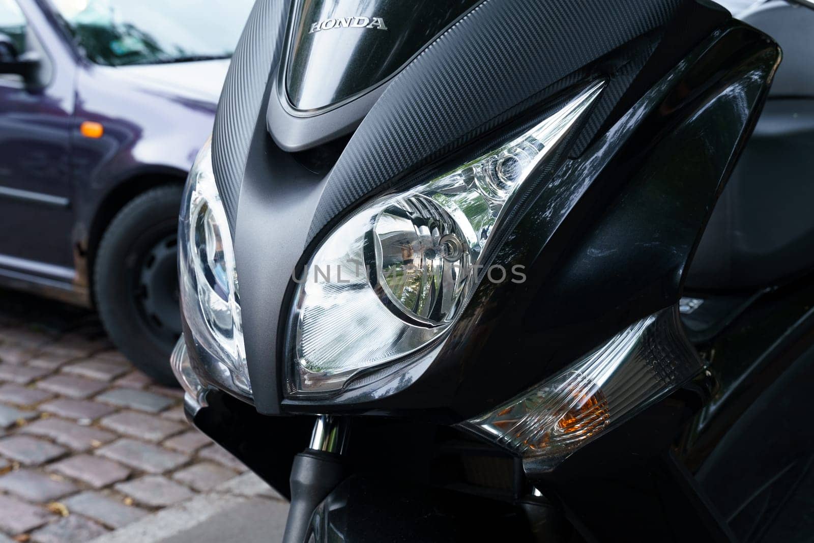 Warsaw, Poland - August 6, 2023: Front view of headlights and Honda motorcycle logo