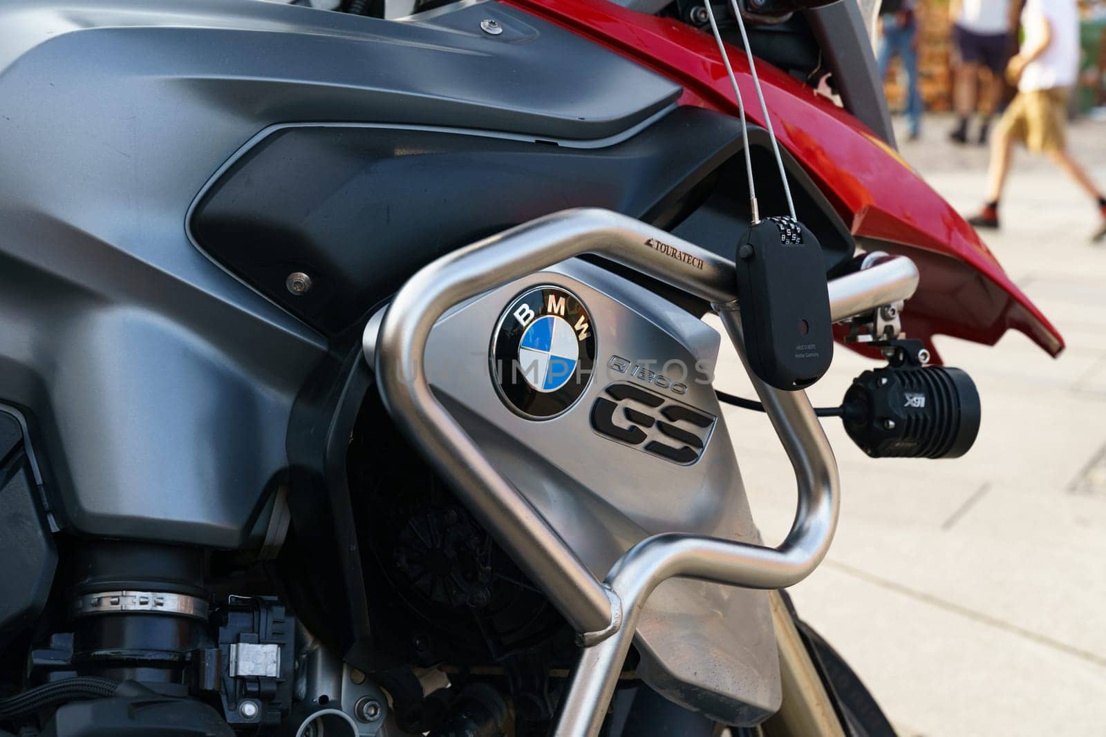 Warsaw, Poland - August 6, 2023: Detailed view of the BMW R1200 motorcycle. Logo close-up.