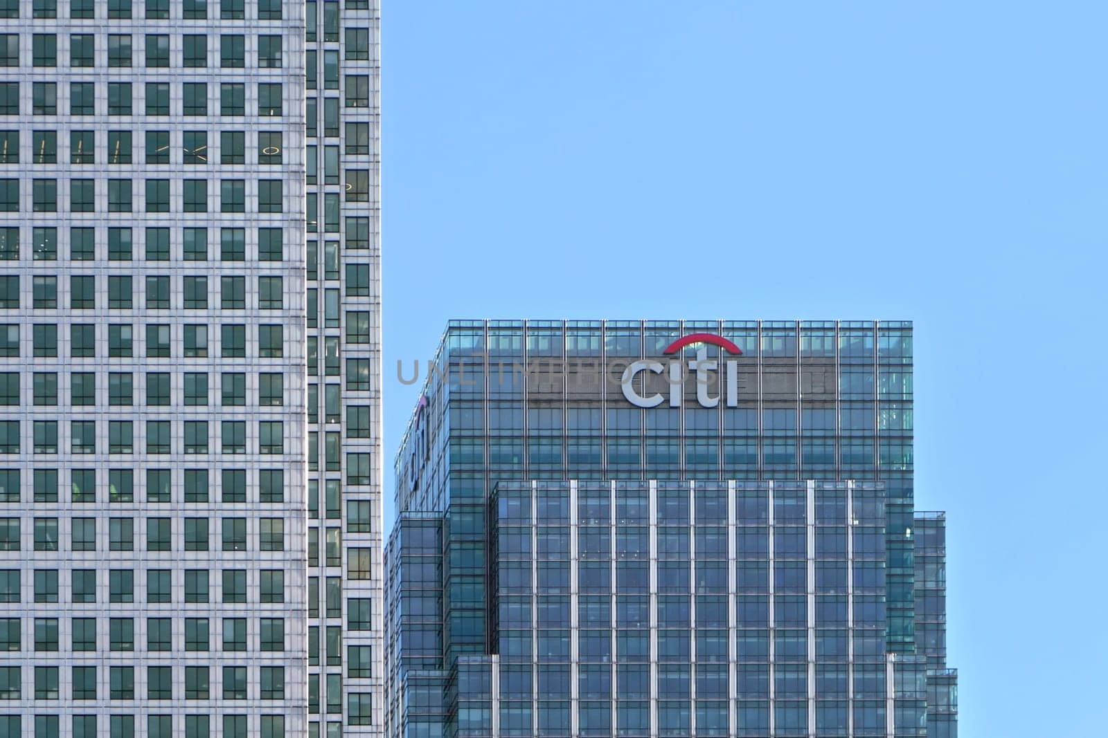 London, United Kingdom - February 03, 2019: Sun shines on Citi EMEA headquarters at Canary Wharf. Citibank (Citigroup Inc.) is American investment bank founded 1988. by Ivanko