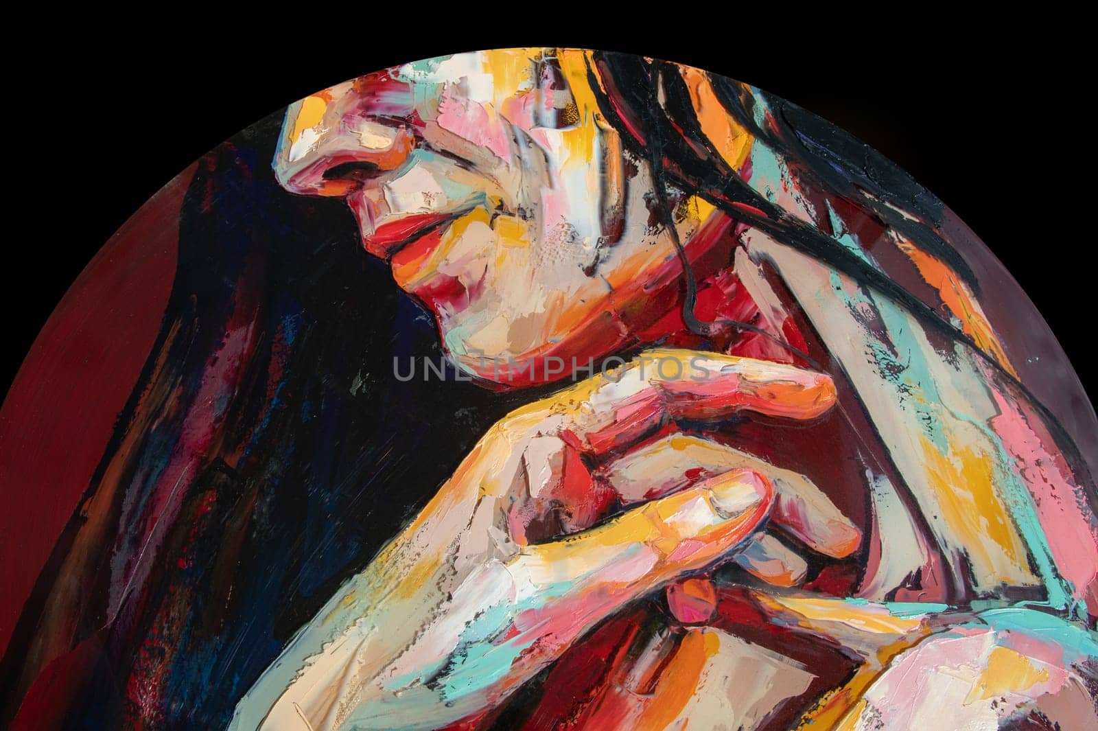 A fragment of the painting Girl on a Red Circle was painted with a palette knife and oil paints on round plywood. Conceptual abstract picture of a beautiful girl.