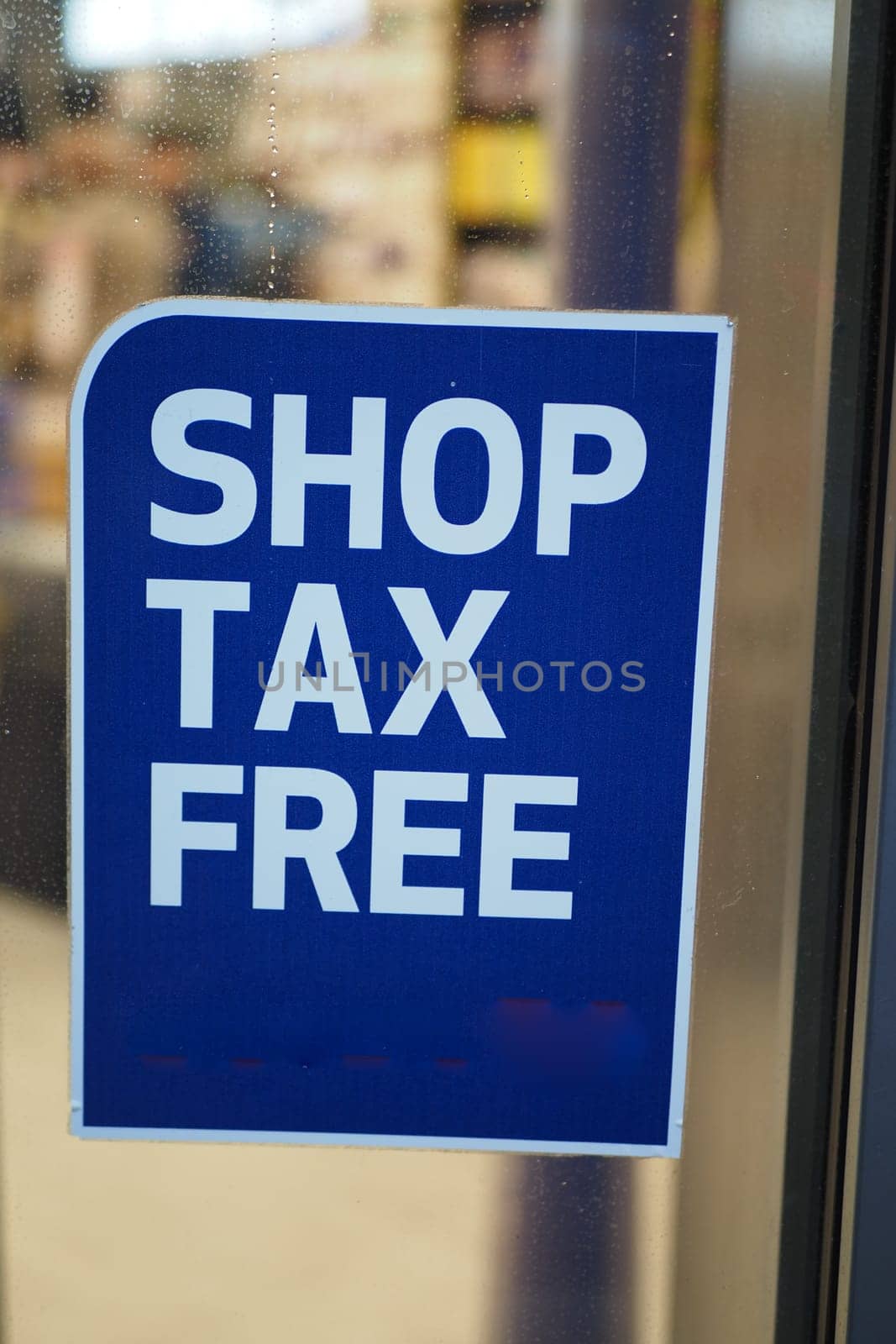shop tax free text duty free shop sign on shop window by towfiq007