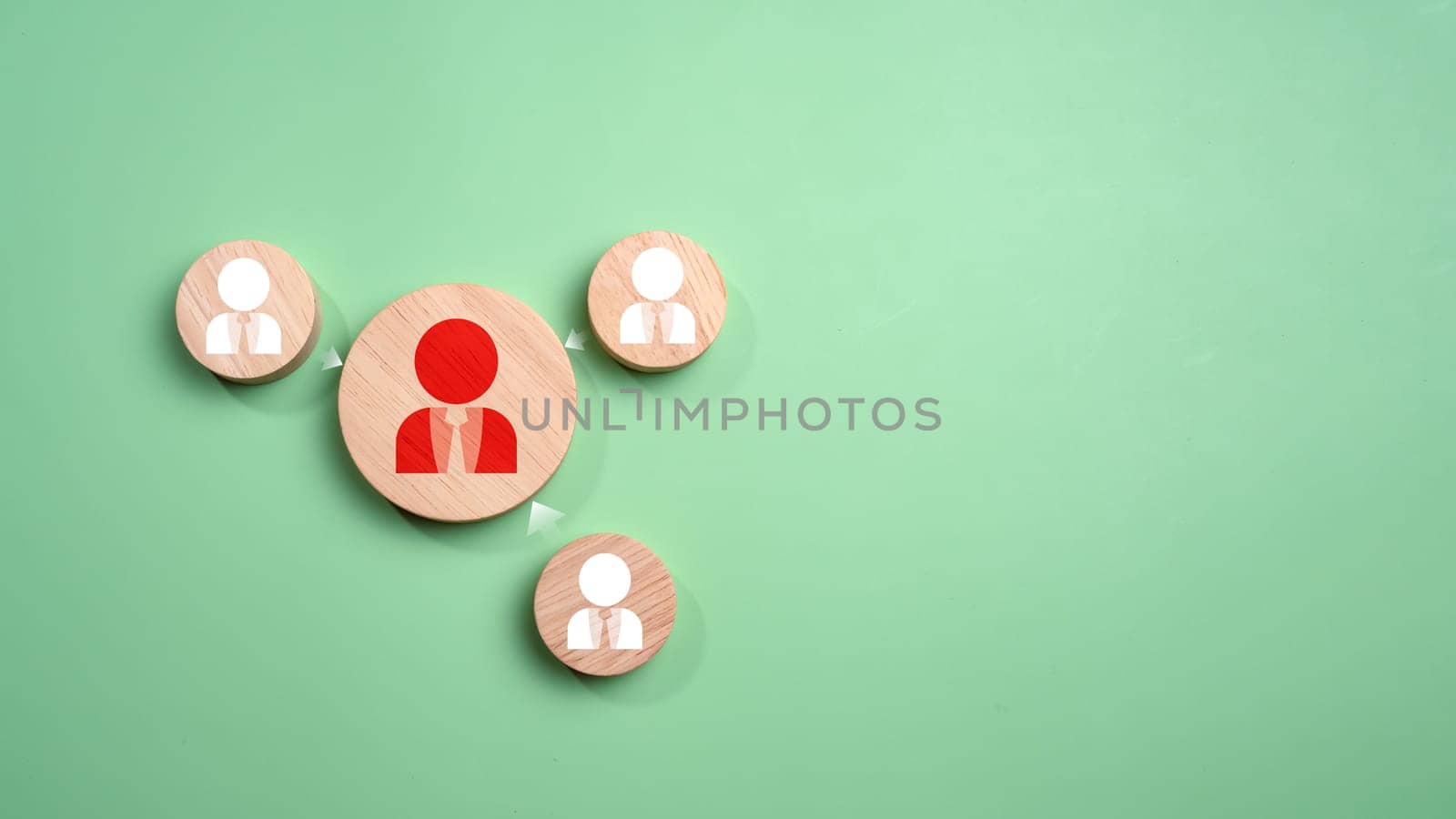 Circular wood with printed target icons and business symbols on light blue background, business goals and objectives concept, business competition, Customer relationship management concept. by Unimages2527