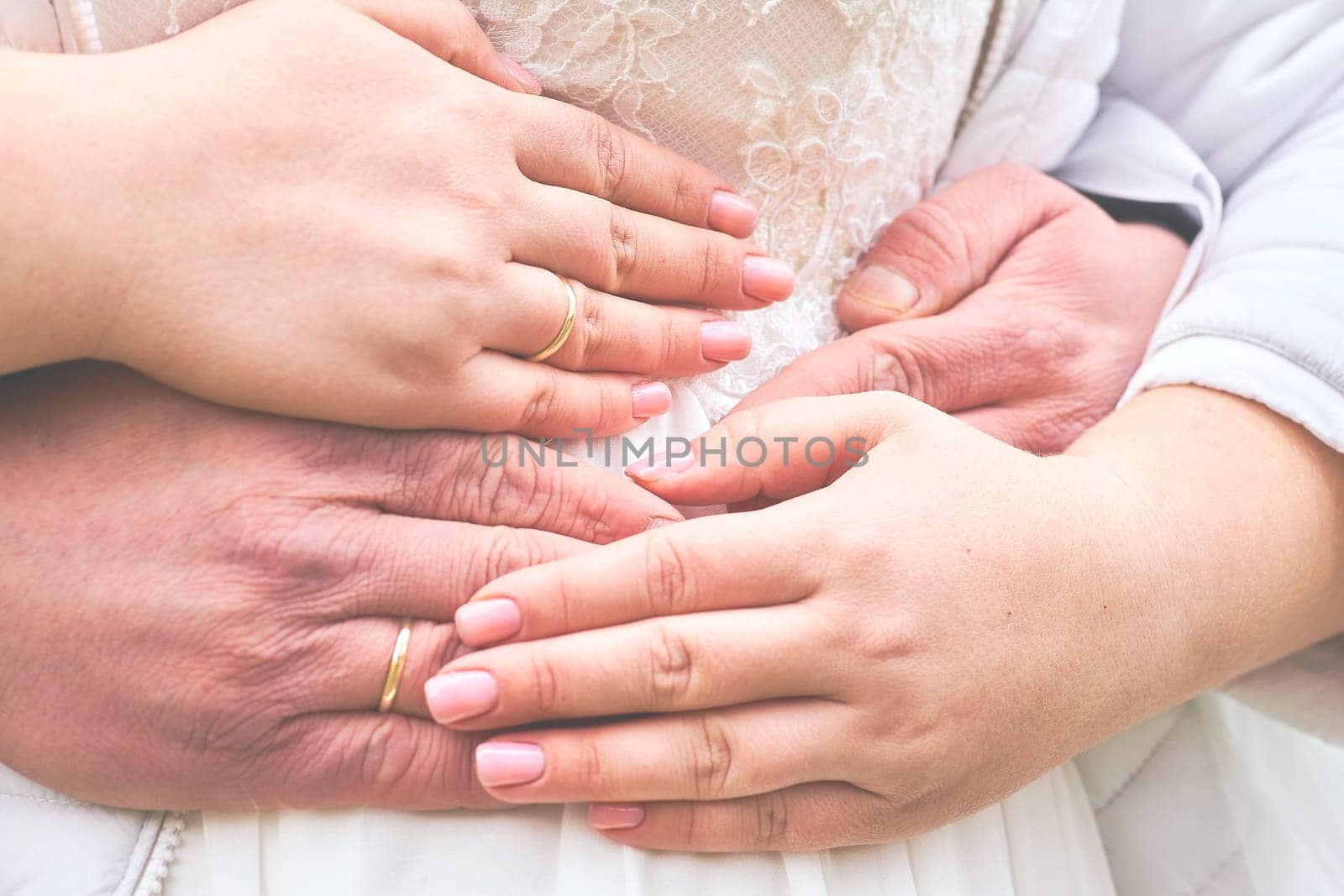 Hands of newlyweds with wedding rings, wedding, bride and groom by jovani68