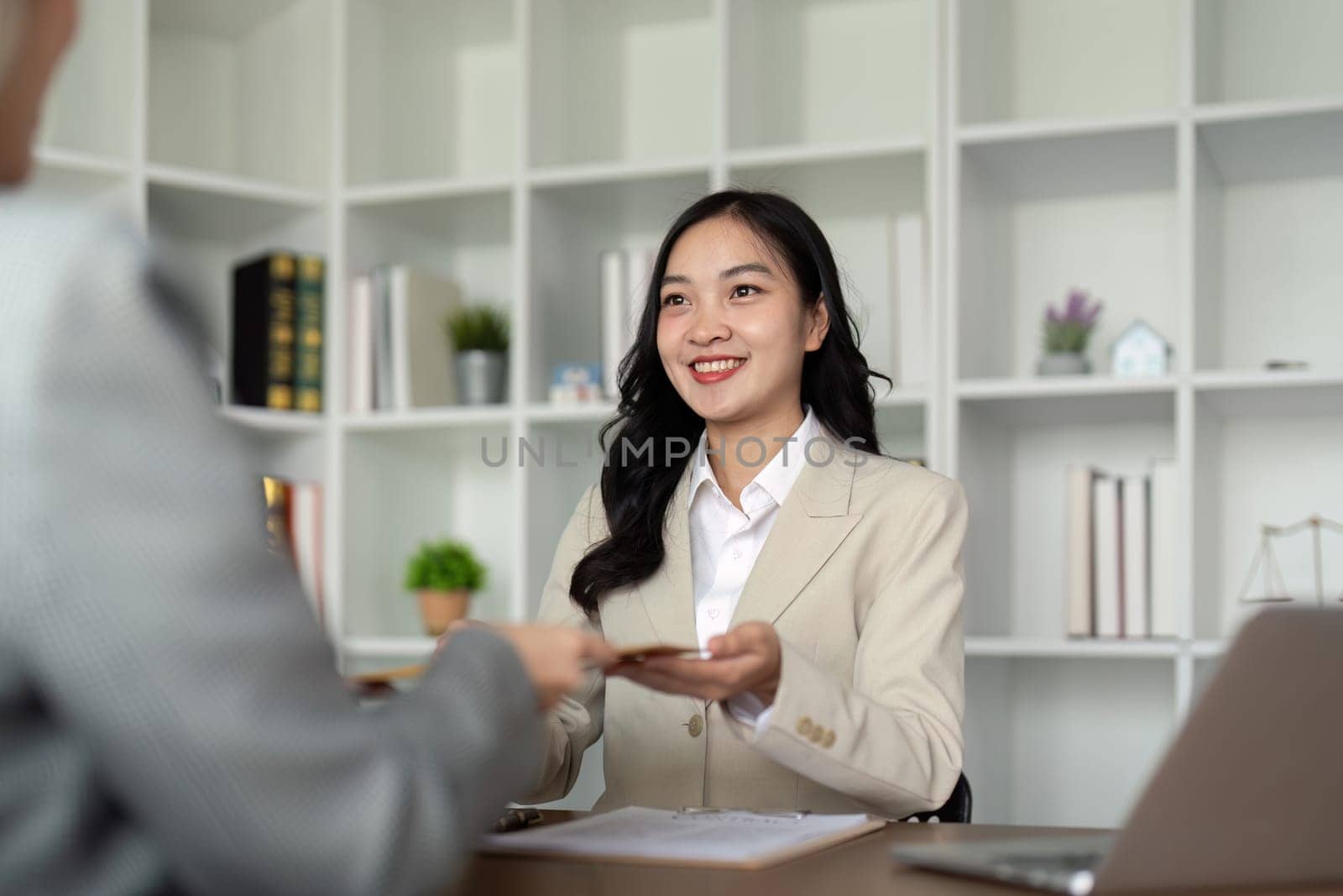 Company hired the lawyer office as a legal advisor and draft the contract so that the client could signs the right contract. Contract of sale was on the table in the lawyer office.