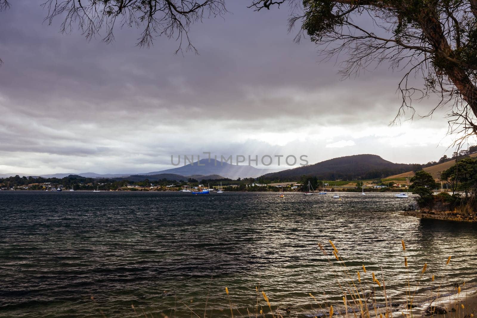 DOVER AUSTRALIA - FEBRUARY 25, 2024: Views of the quaint town of Dover and the Port of Esperance waterfront on the Southern Peninsula in Huon Valley, Tasmania, Australia