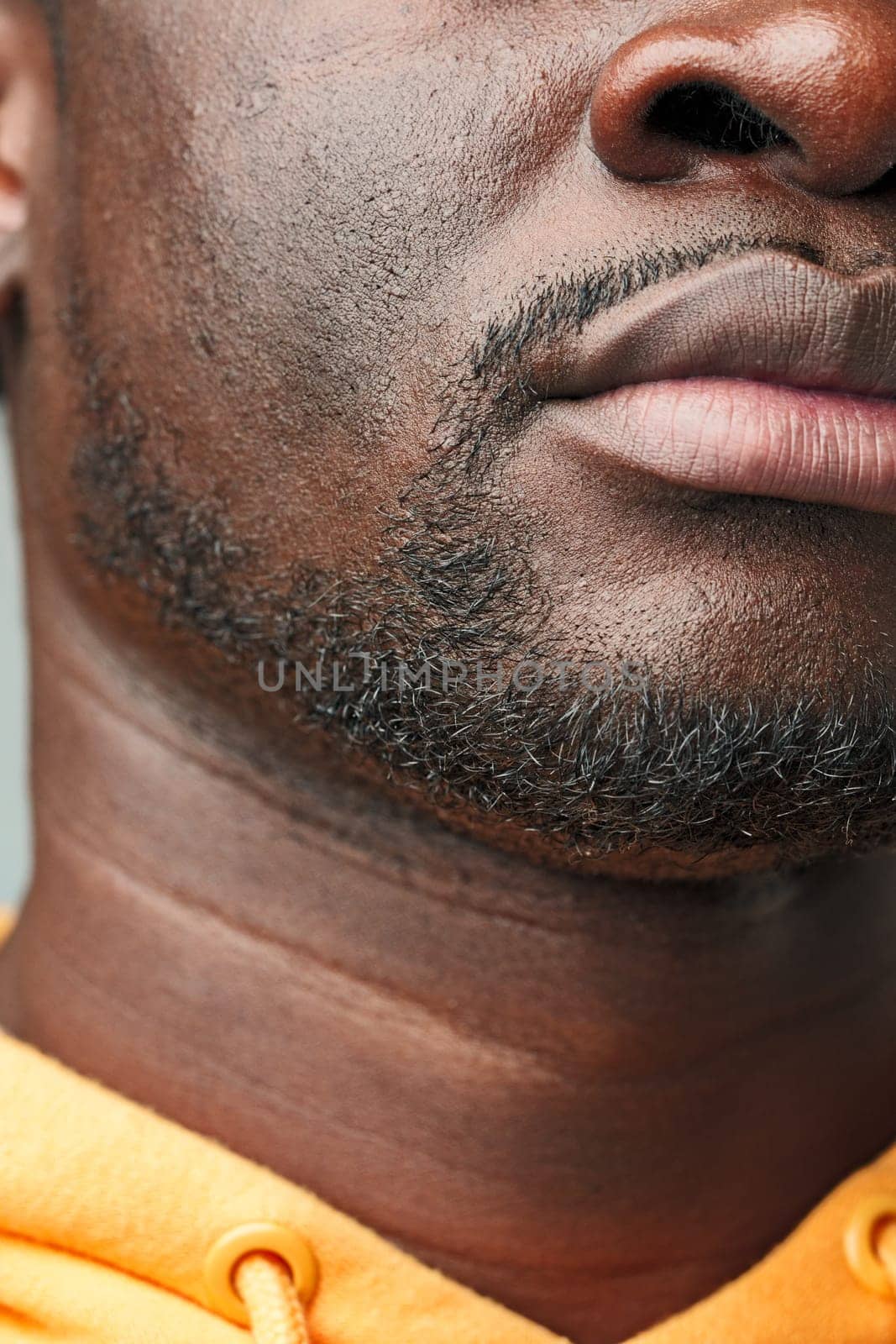 Close-Up of African Mans Lower Face and Lips studio shot