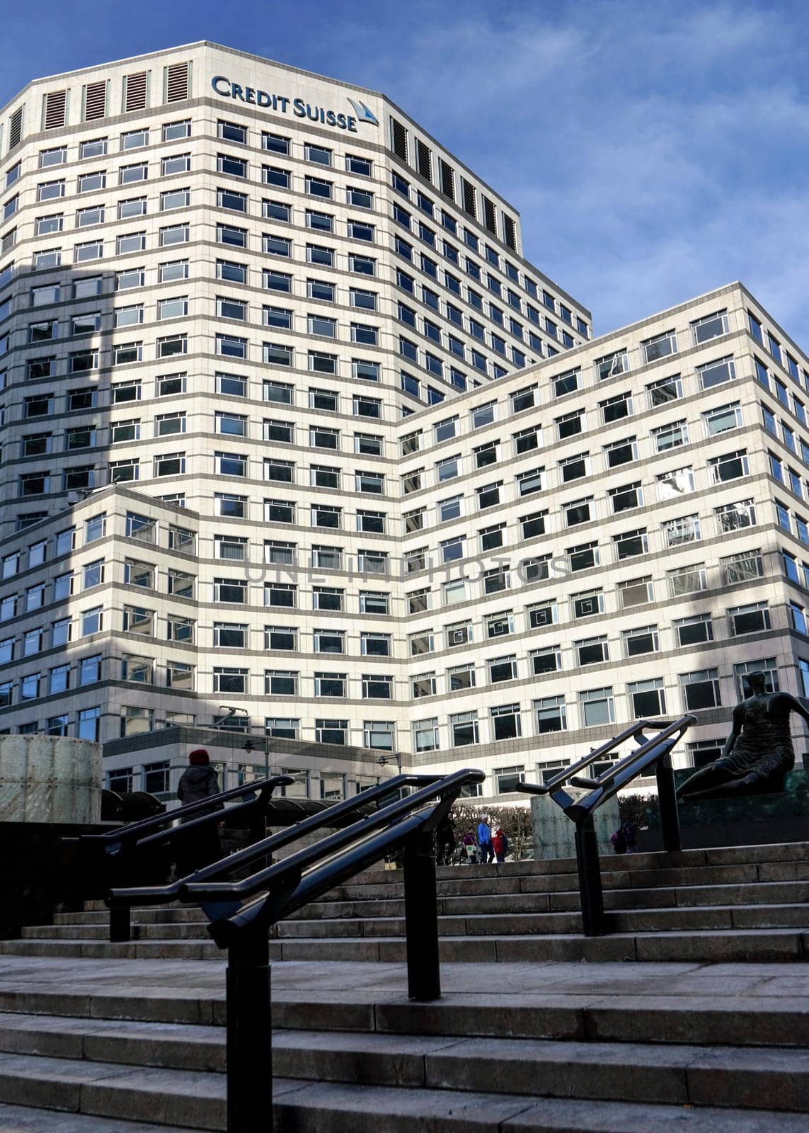 London, United Kingdom - February 03, 2019: Modern offices of UK branch of Credit Suisse at Canary Wharf. CS Group AG is multinational investment bank founded in 1856 by Ivanko