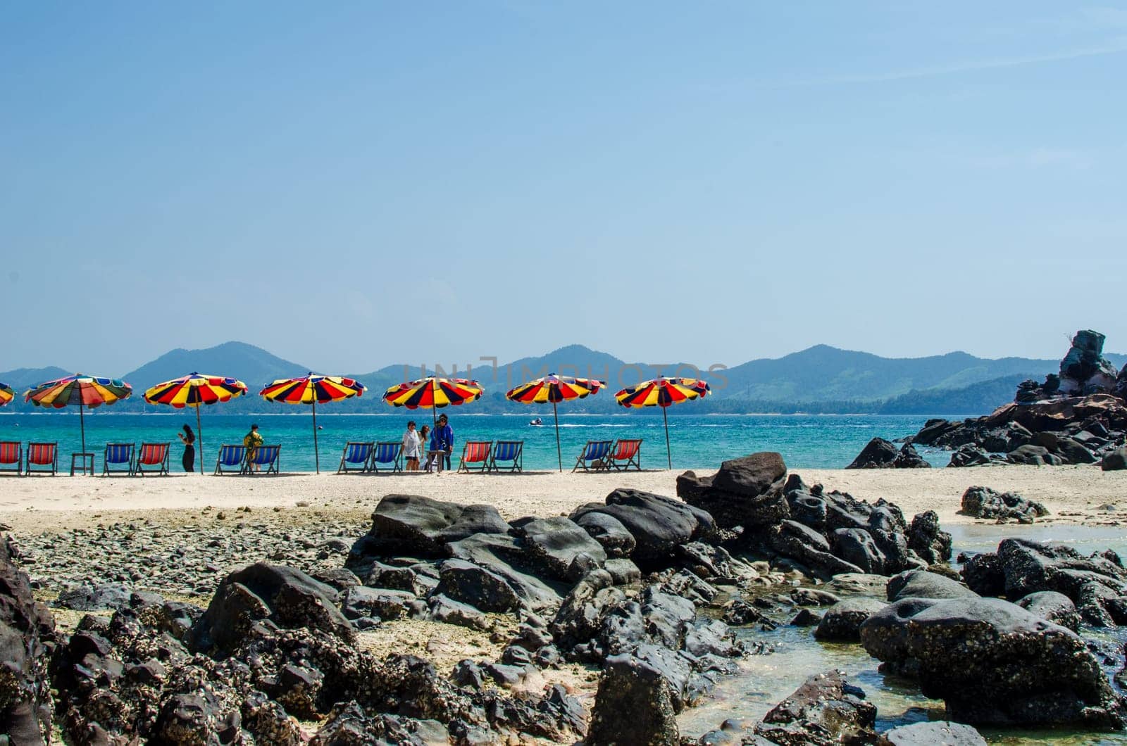 Rocks and stone beach Similan Islands with famous Sail Rock, Phang Nga Thailand nature landscape.