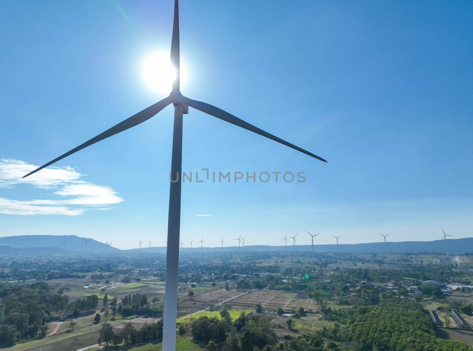 Landscape of wind farm. Wind energy. Wind power. Sustainable, renewable energy. Wind turbines generate electricity. Sustainable development. Green technology for energy sustainability. Green energy. by Fahroni