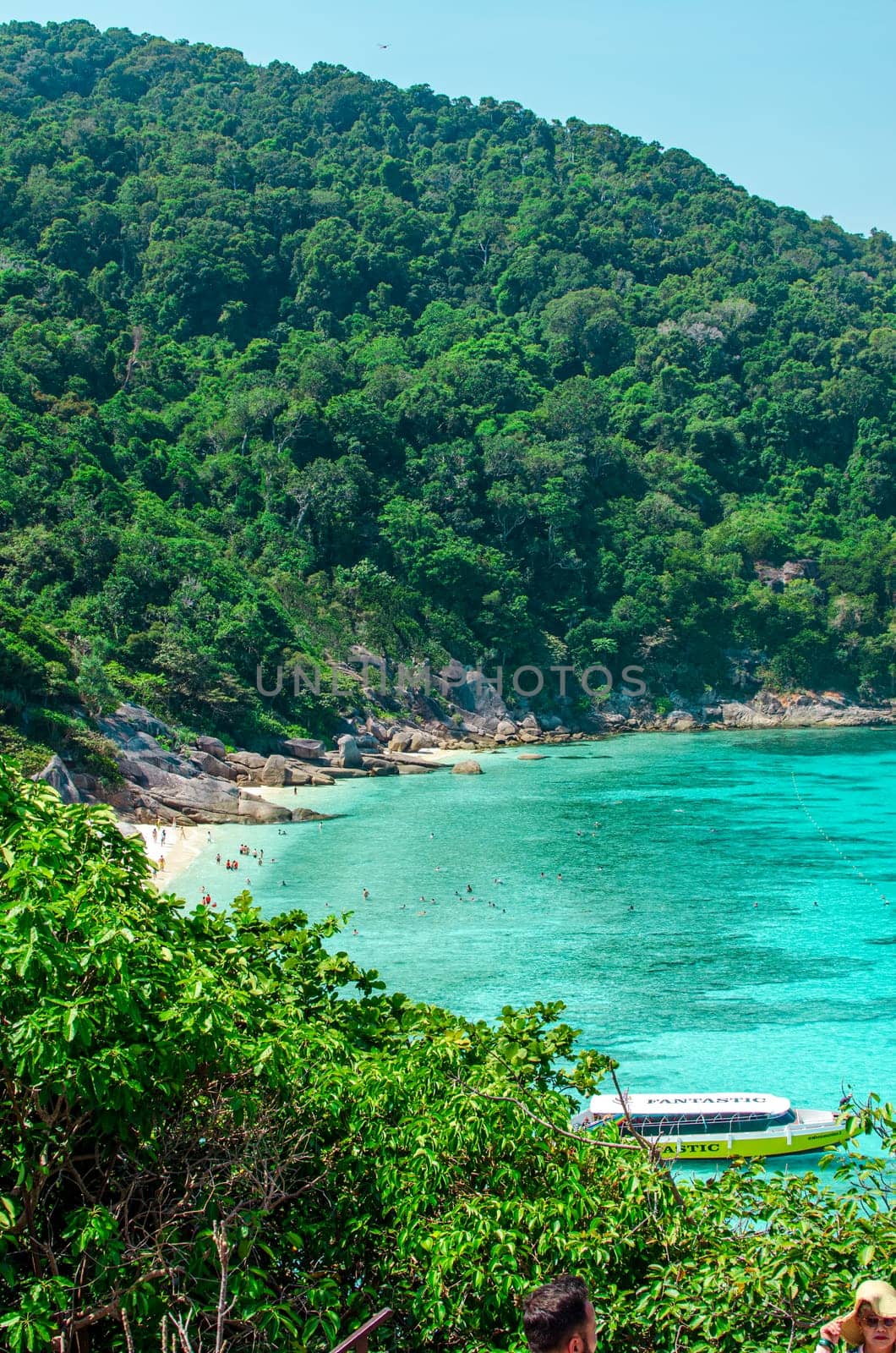 Tropical islands of ocean blue sea water and white sand beach at Similan Islands with famous Sail Rock, Phang Nga Thailand nature landscape. High quality photo