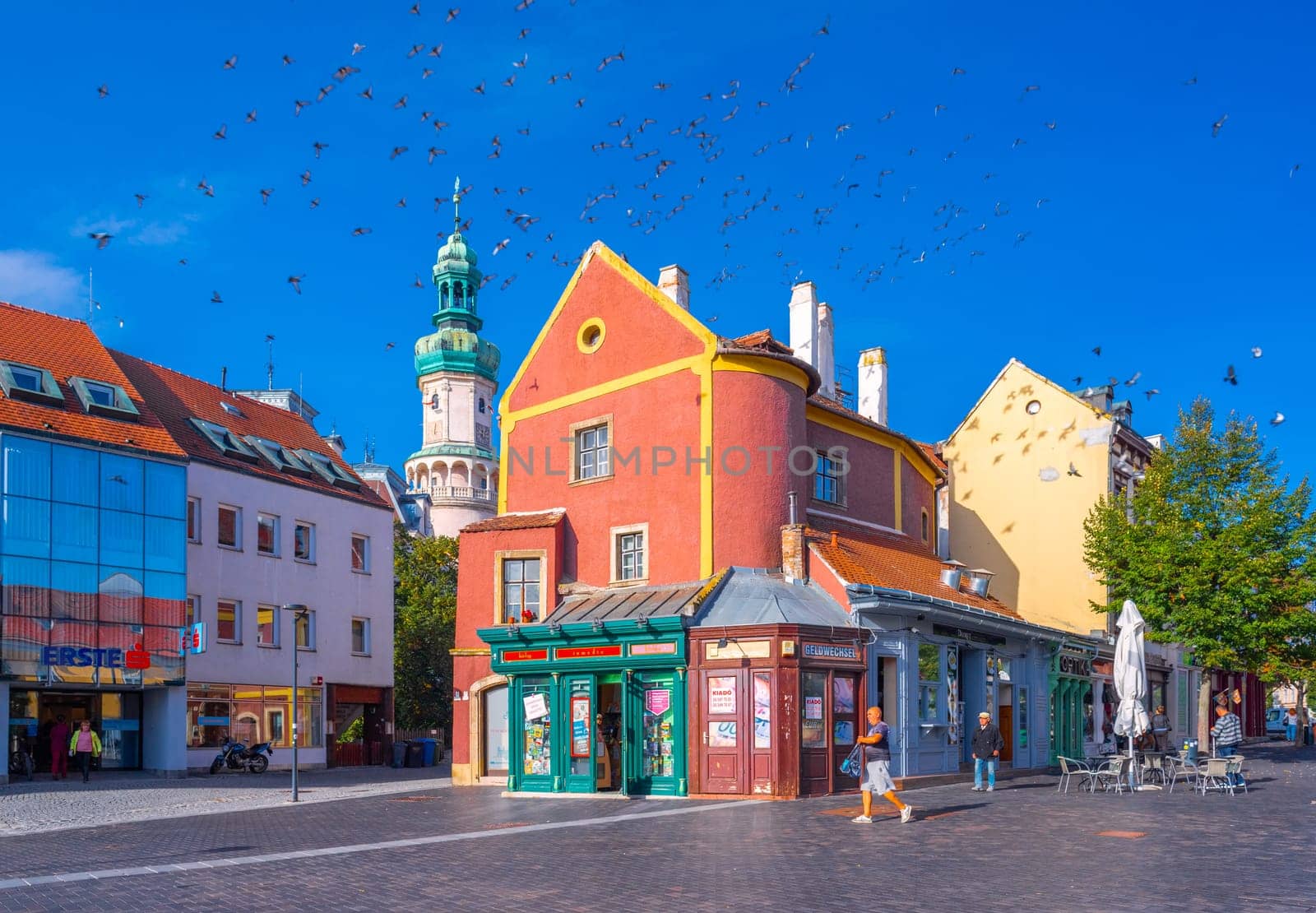 Sopron, Hungary - 13 October 2023: View of old colorful historical houses and vintage shop kiosks in the central part of Sopron