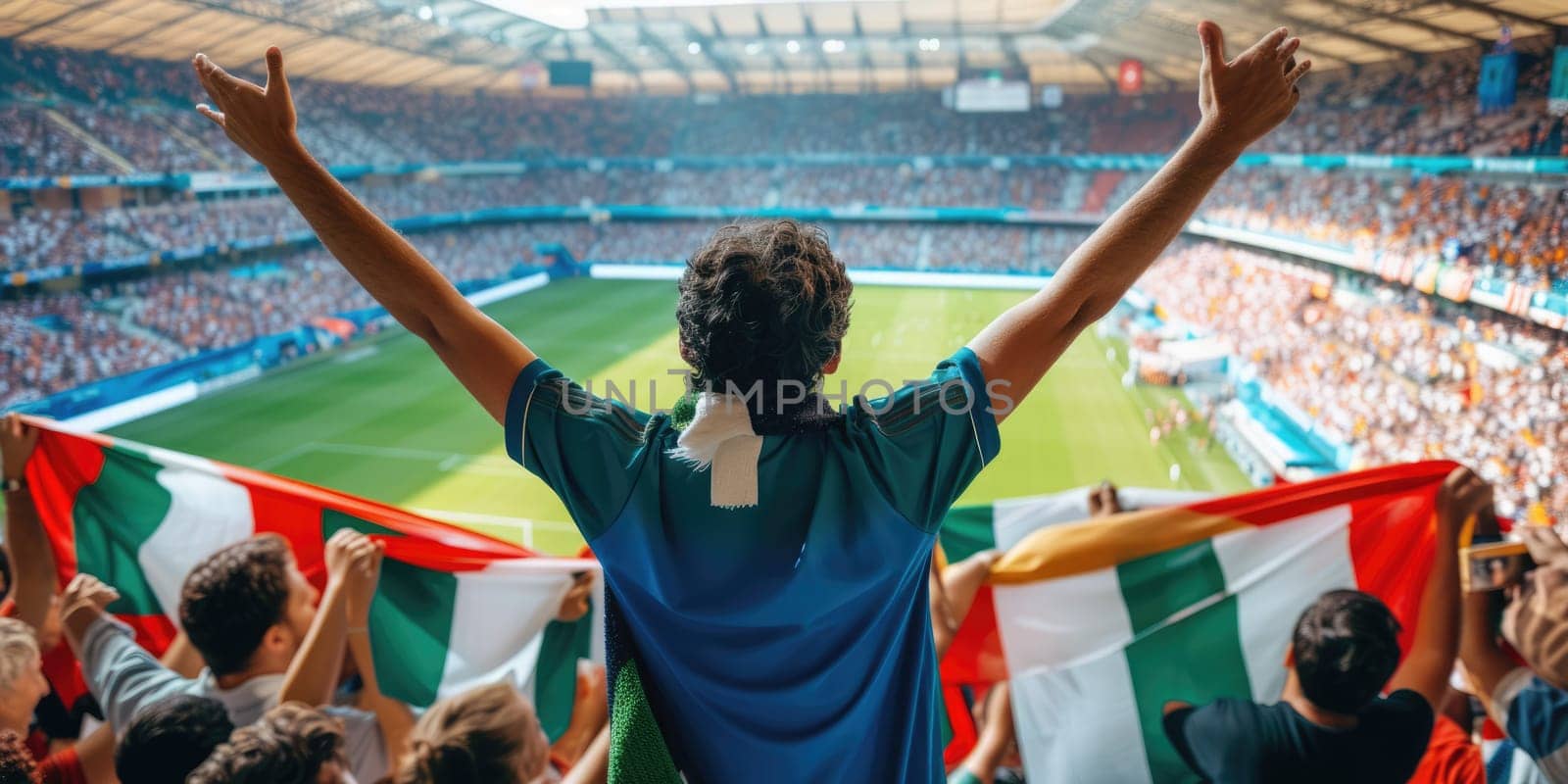 A fan at a soccer match joyfully celebrates a thrilling event, raising his arms in excitement. The Cup match provides entertainment and fun for leisure seekers. AIG41