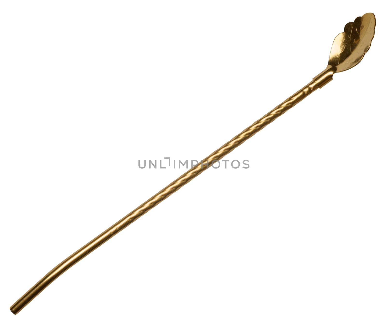 Golden cocktail spoon straw on isolated background, close up