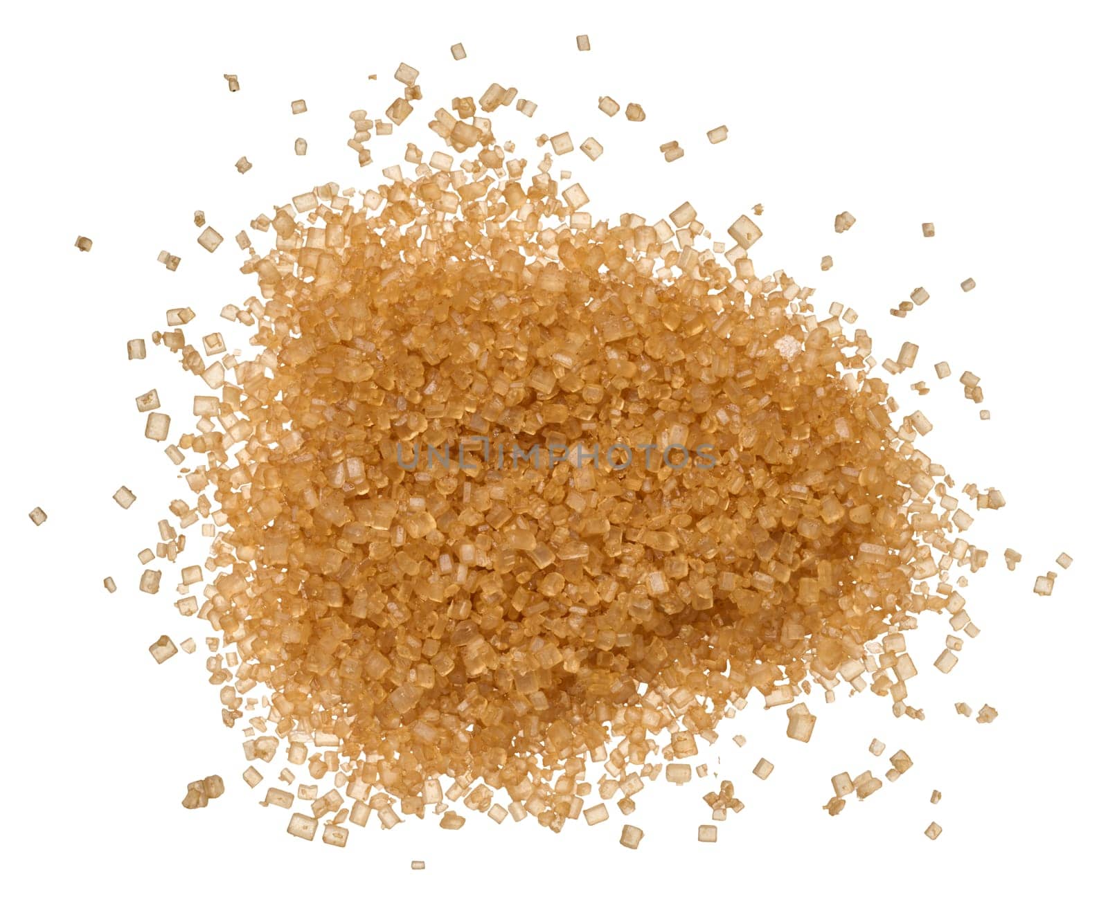 Brown cane sugar granules on isolated background, top view