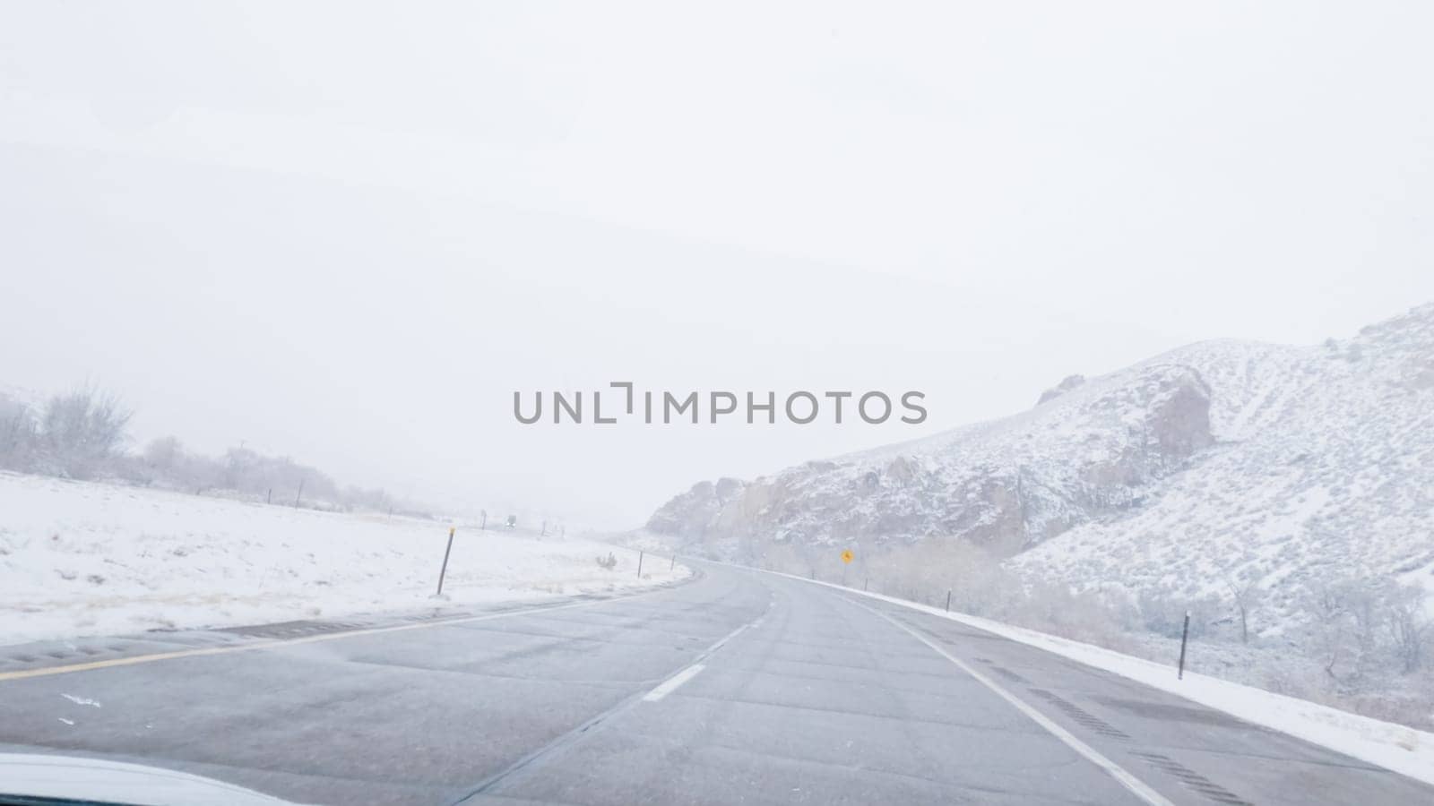 Braving a Winter Storm Driving Through Western Colorado by arinahabich