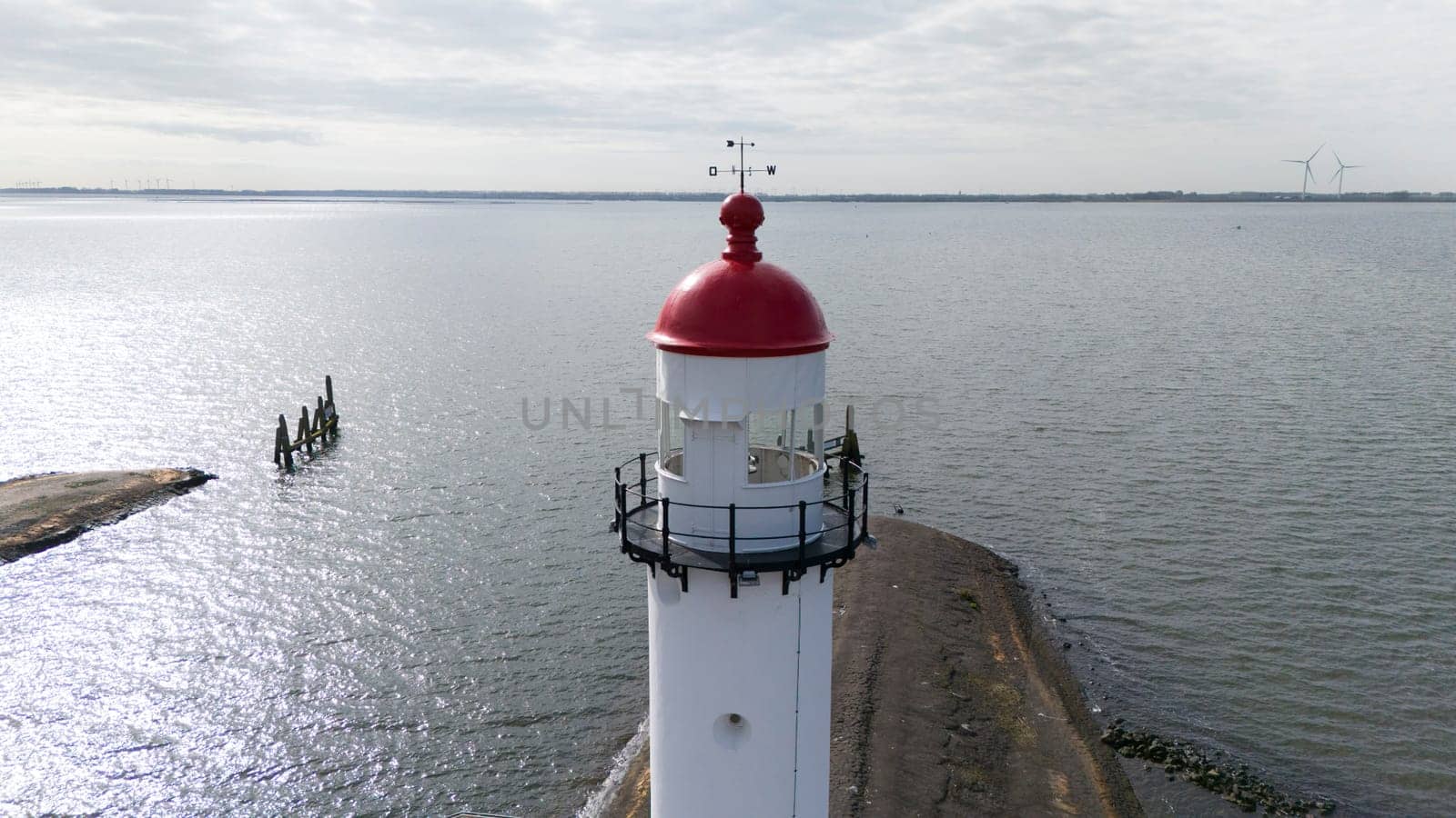 The lighthouse in Hellevoetsluisin the netherlands made with a drone aerial view