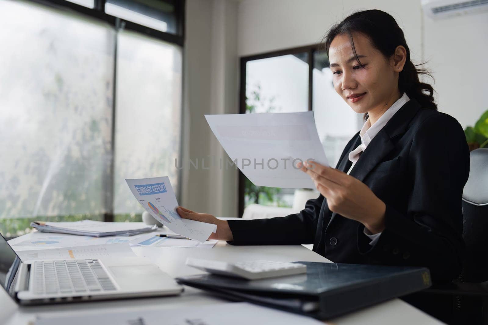 Accountant working on financial data analysis dashboard on paper as marketing indication for business strategic planning by itchaznong