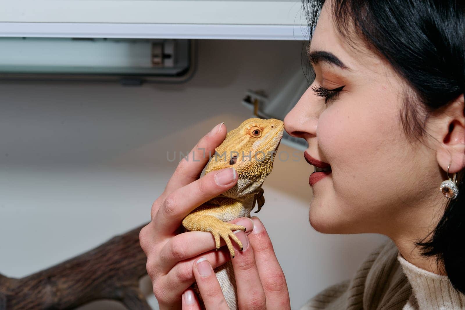 Beautiful Woman Kissing Bearded Dragon Pets by dotshock