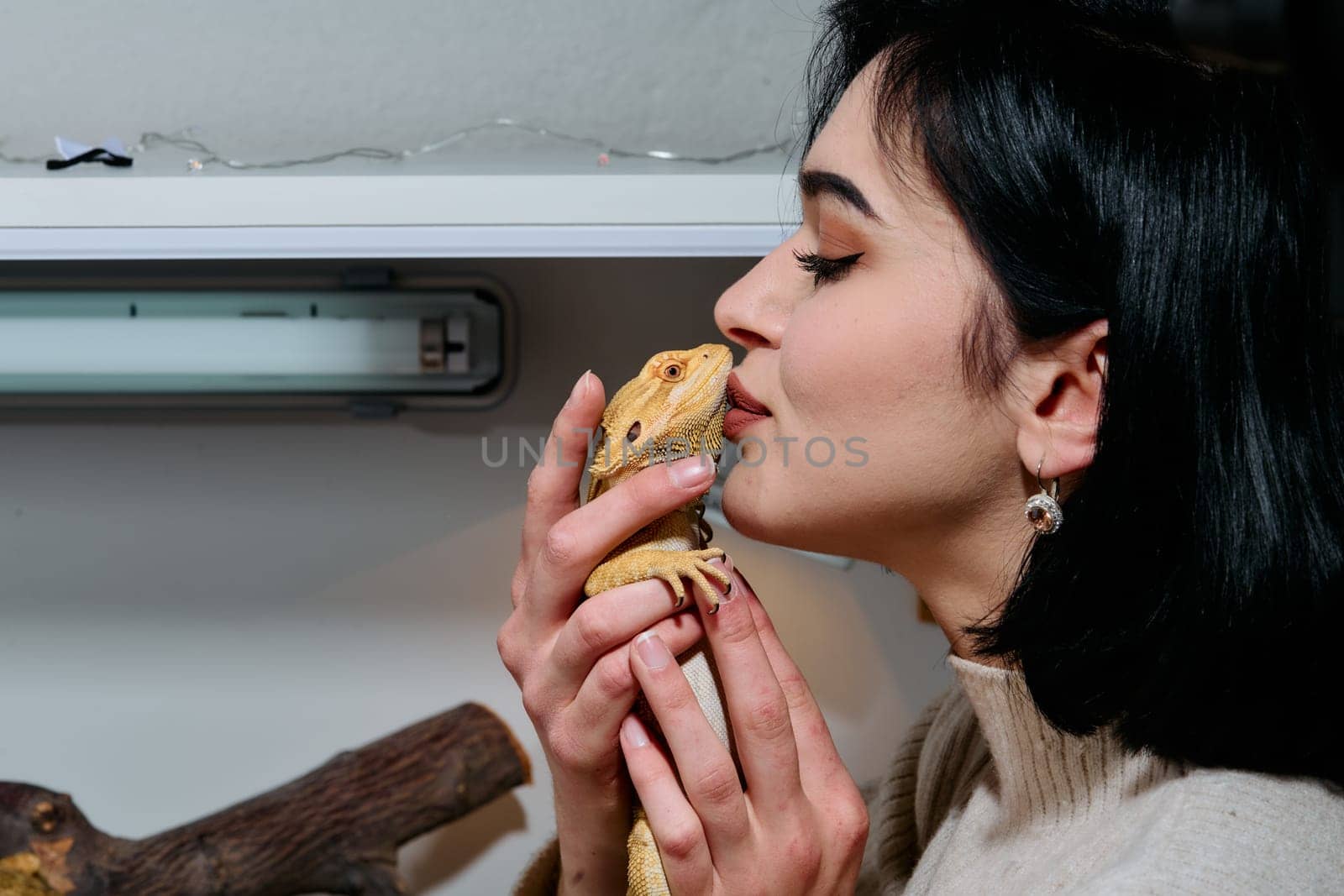 Beautiful Woman Kissing Bearded Dragon Pets by dotshock