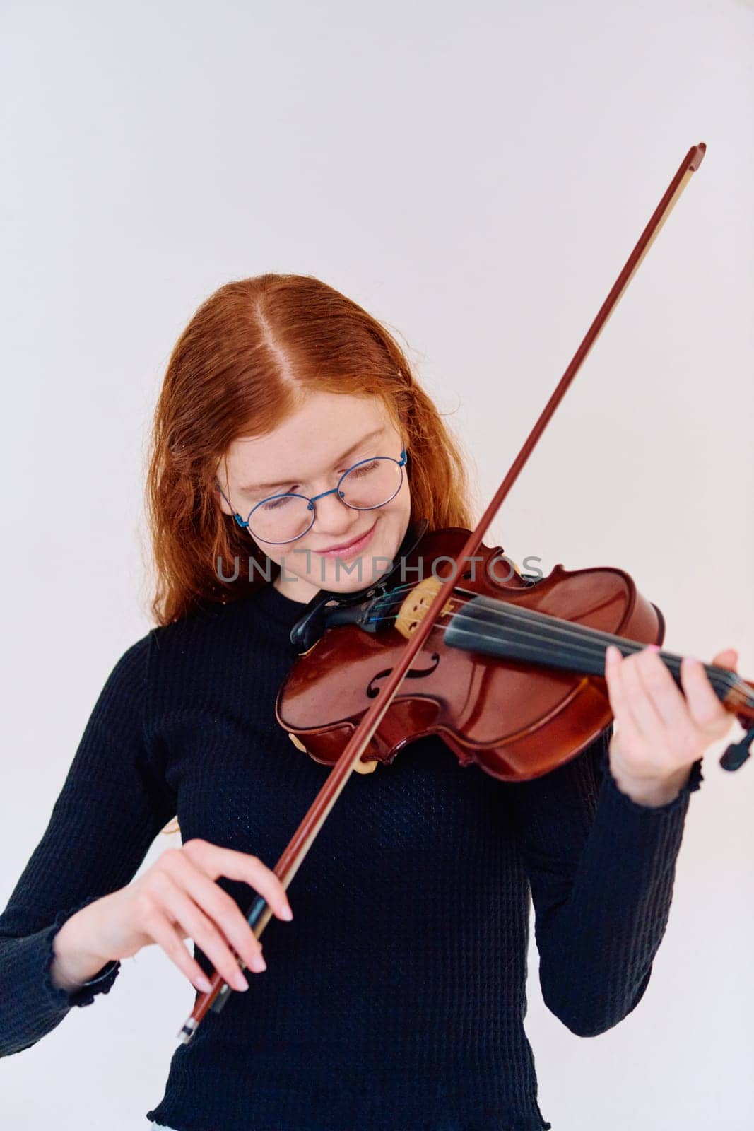 Stunning Redhead Musician Poses with Violin in Captivating Portrait by dotshock