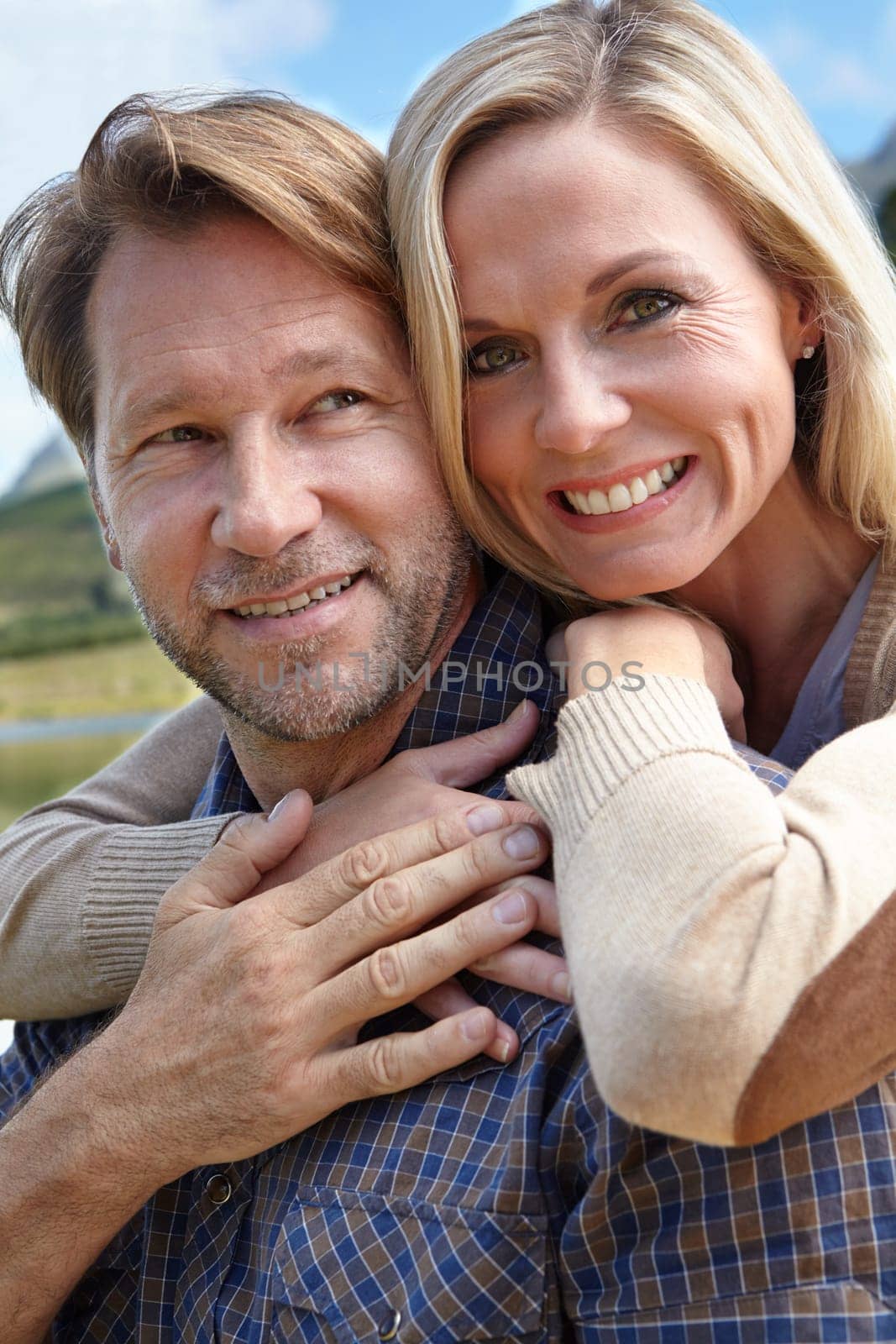 Embrace, love and portrait of couple in nature in summer for vacation, holiday and bonding at countryside. Man, woman and smile with happiness weekend adventure, travel and tourism in Australia.