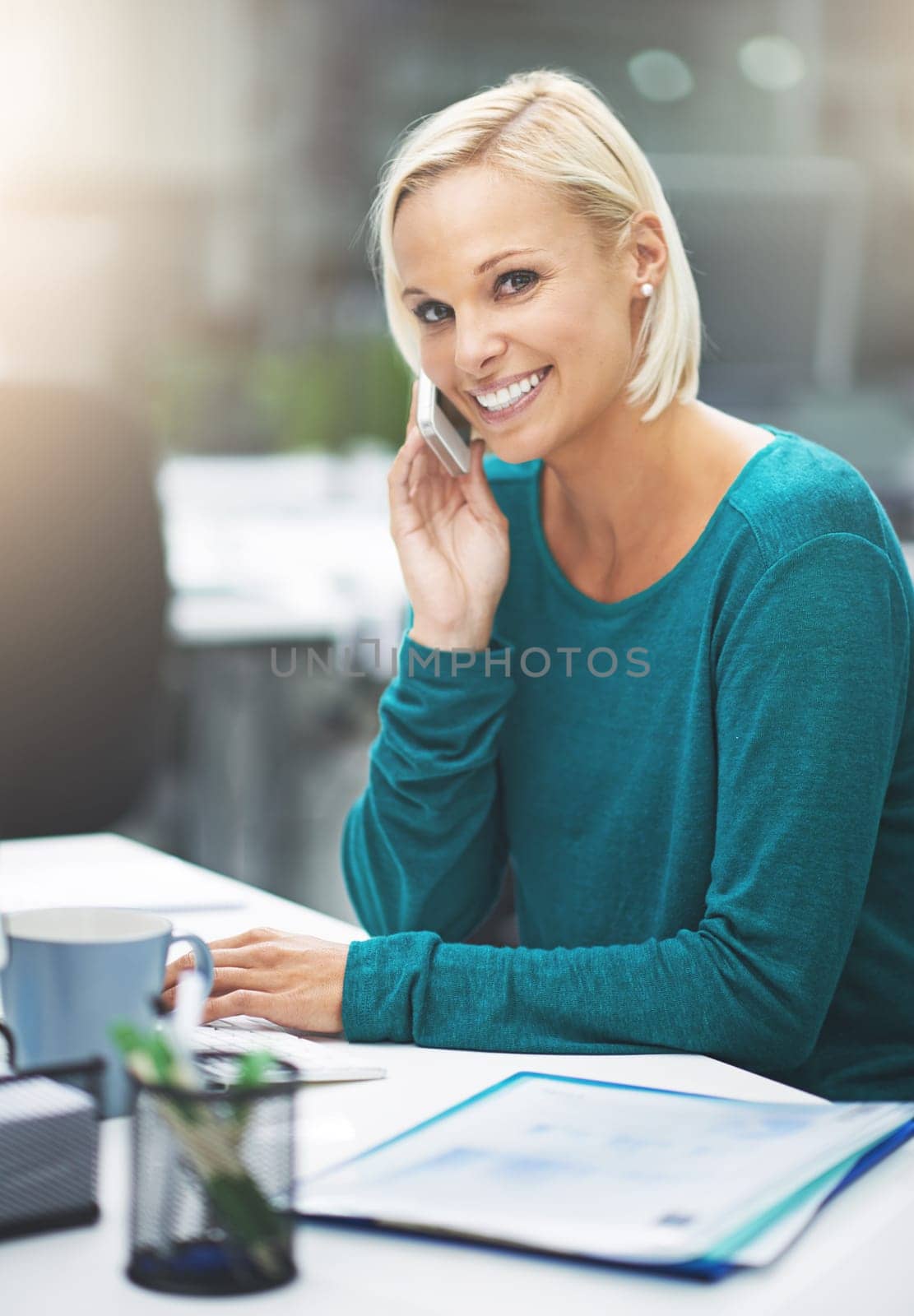 Woman, cell phone call and portrait in office with smile for networking, deal or negotiation. Business person, smartphone and happy for conversation, communication or mobile connection in workplace by YuriArcurs